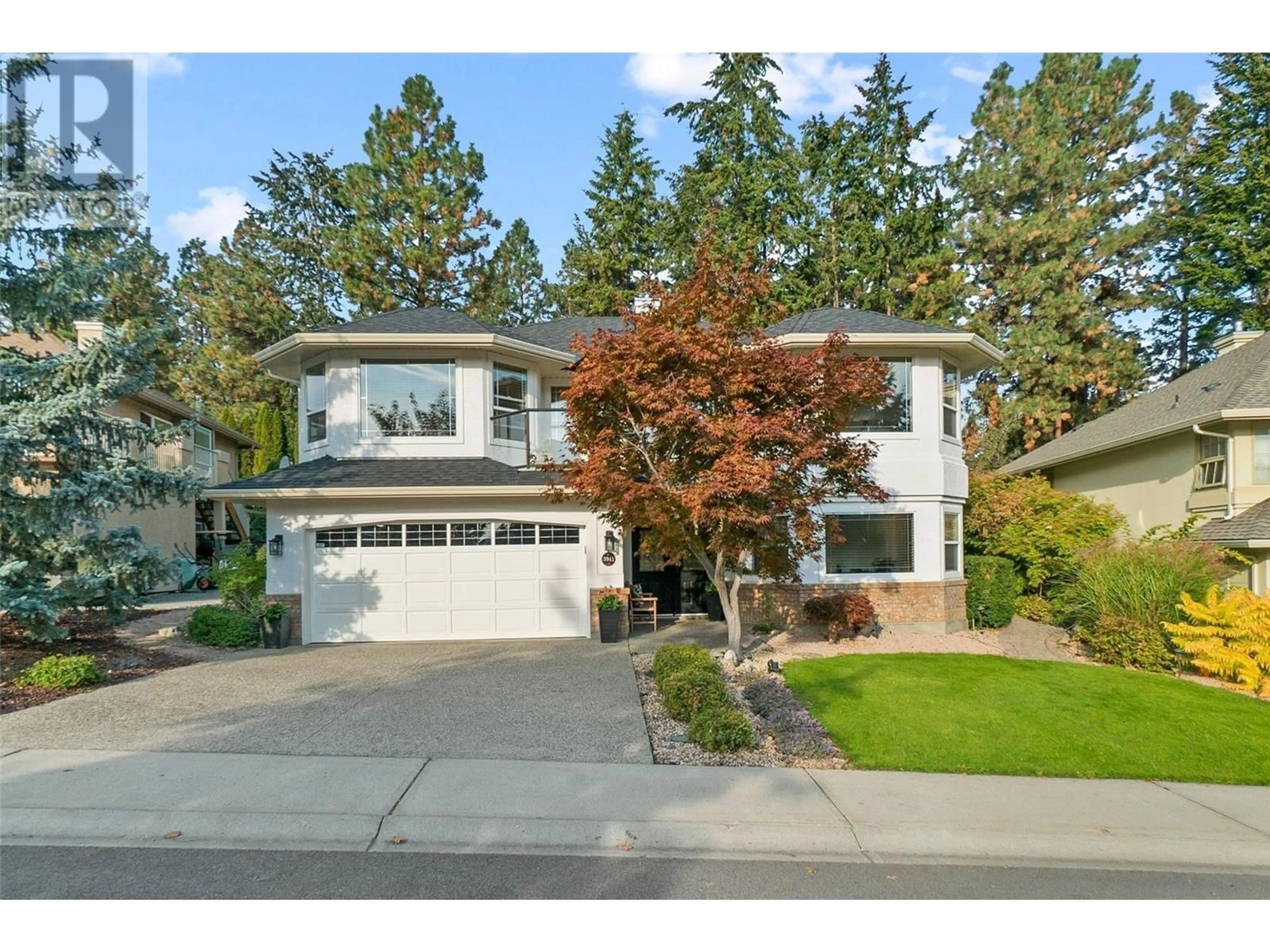 Home with vinyl exterior material, street for 3941 Gallaghers Circle, Kelowna British Columbia V1W3Z9