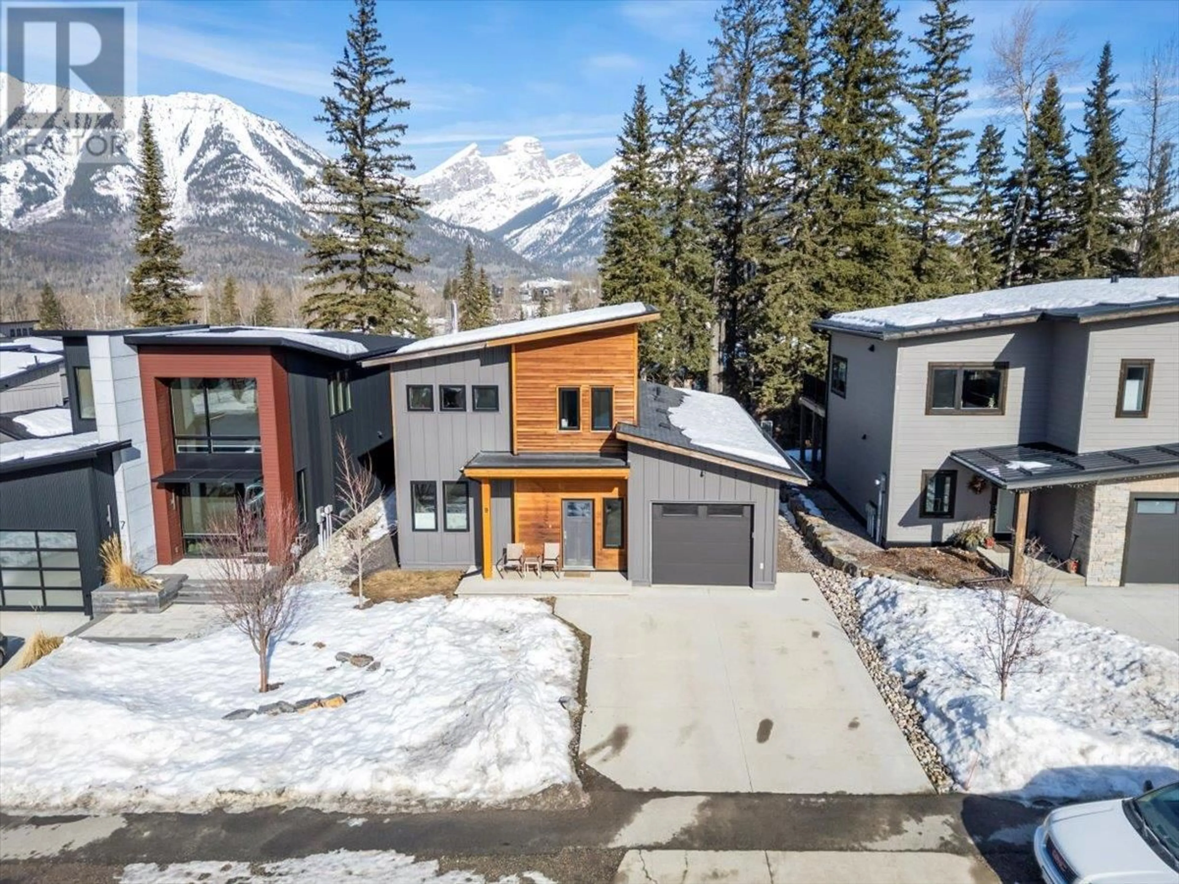 A pic from outside/outdoor area/front of a property/back of a property/a pic from drone, mountain view for 9 Sunniva Drive, Fernie British Columbia V0B1M4