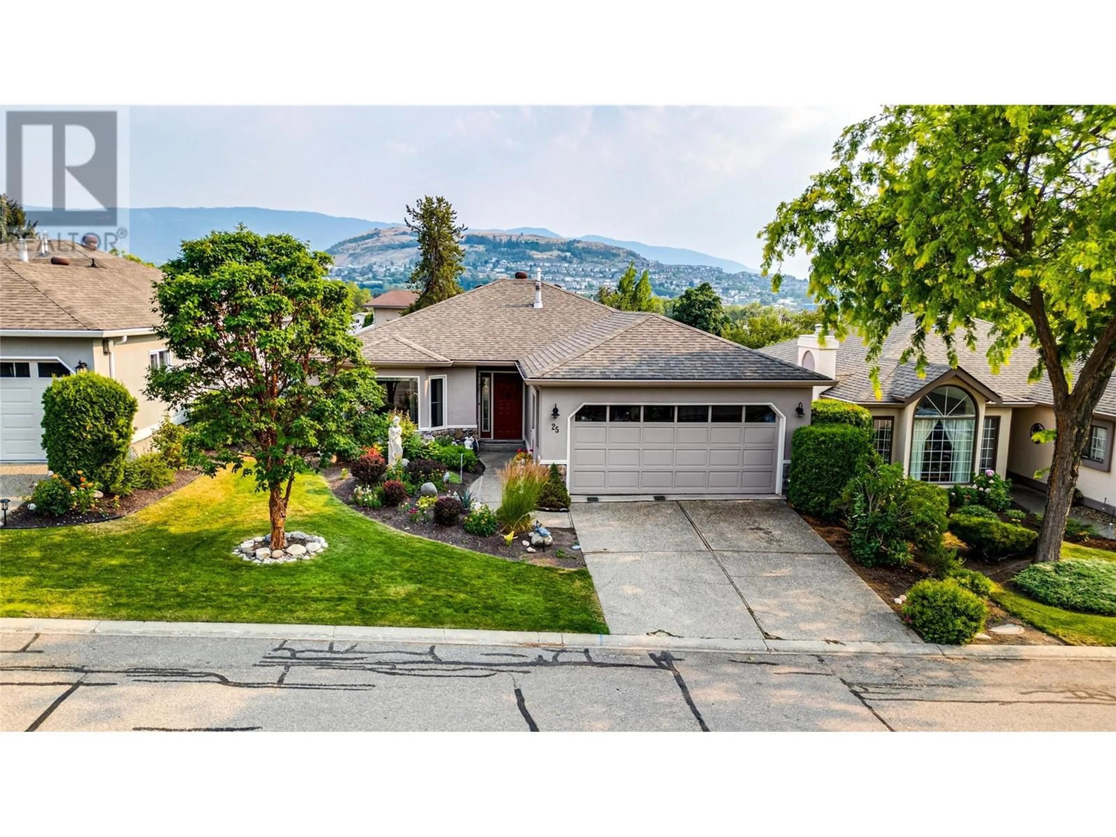 A pic from outside/outdoor area/front of a property/back of a property/a pic from drone, mountain view for 25 - 1220 25 AVENUE, Vernon British Columbia V1T9A1
