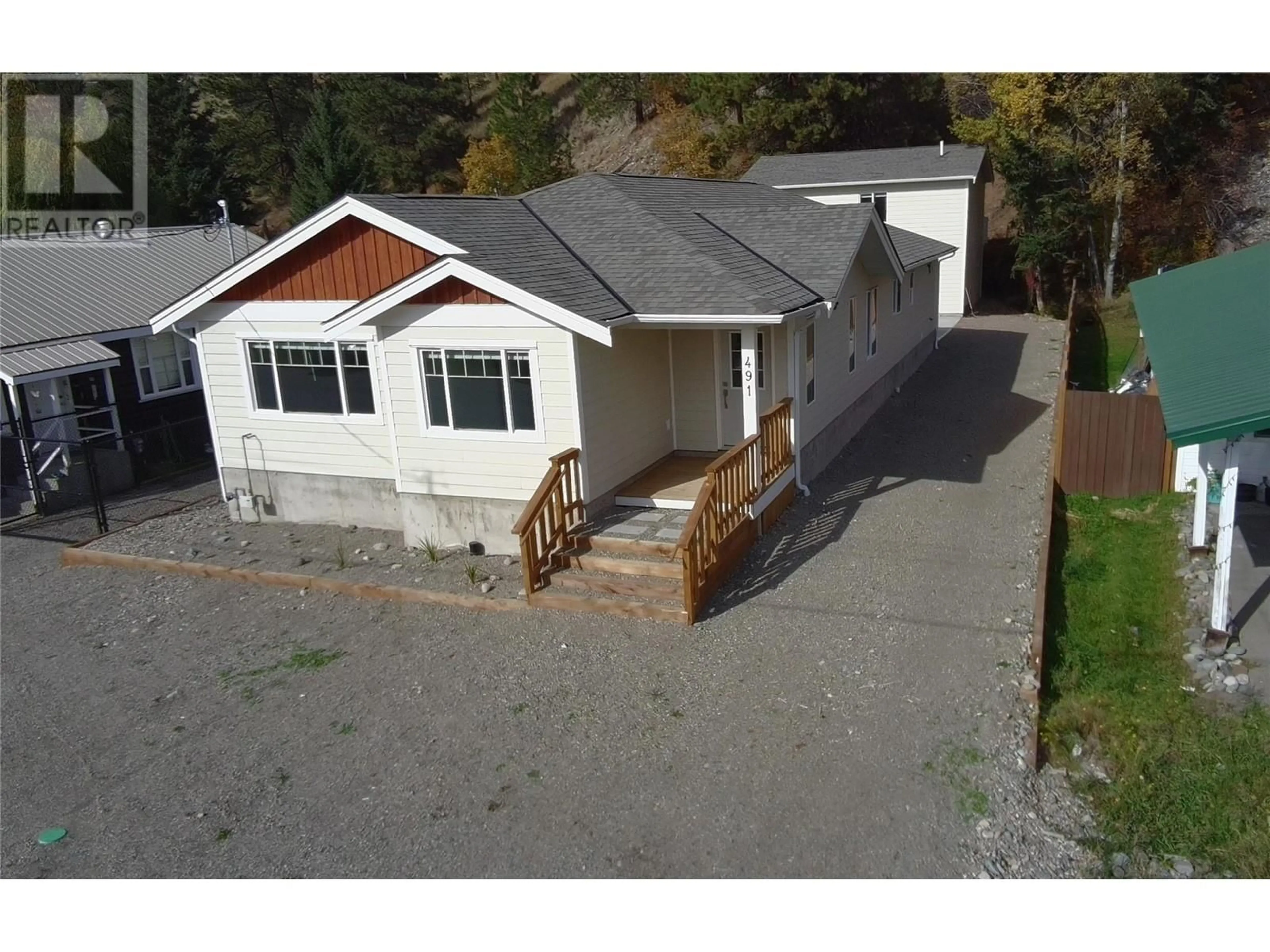 A pic from outside/outdoor area/front of a property/back of a property/a pic from drone, street for 491 Auburn Crescent, Princeton British Columbia V0X1W0