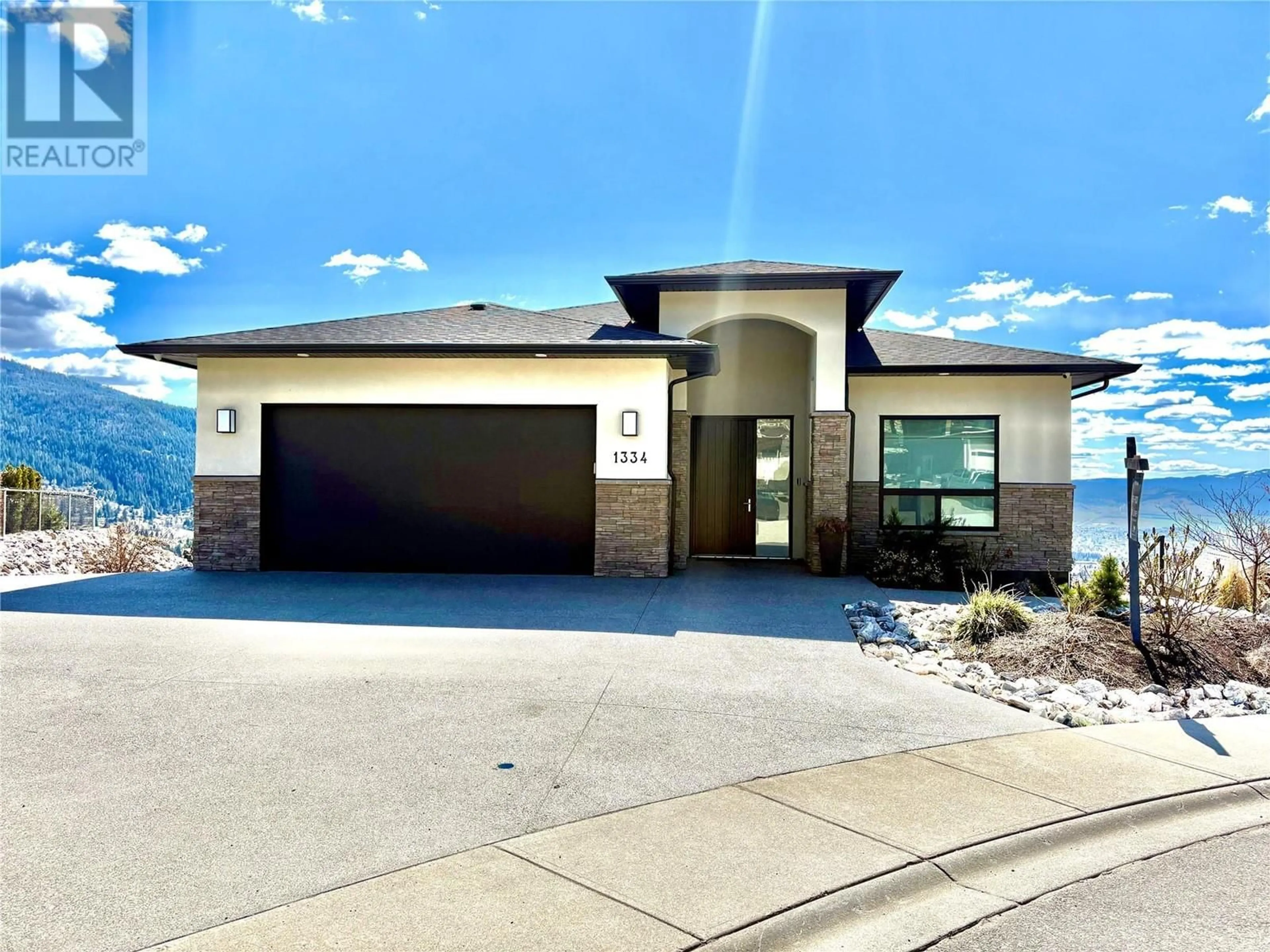 Home with brick exterior material, street for 1334 RED MOUNTAIN PLACE, Vernon British Columbia V1B4A3