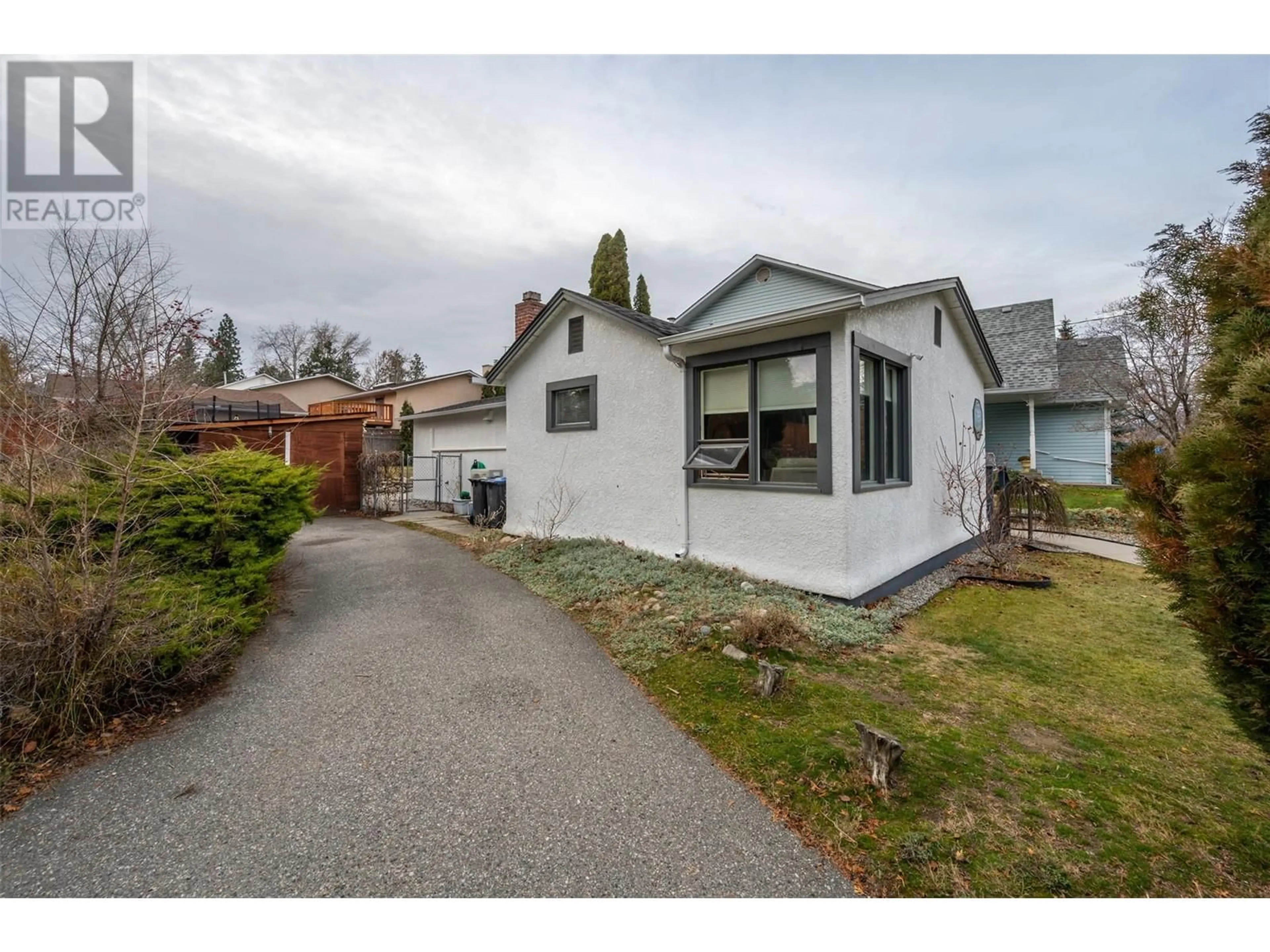 A pic from outside/outdoor area/front of a property/back of a property/a pic from drone, street for 1070 Forestbrook Drive, Penticton British Columbia V2A2G3