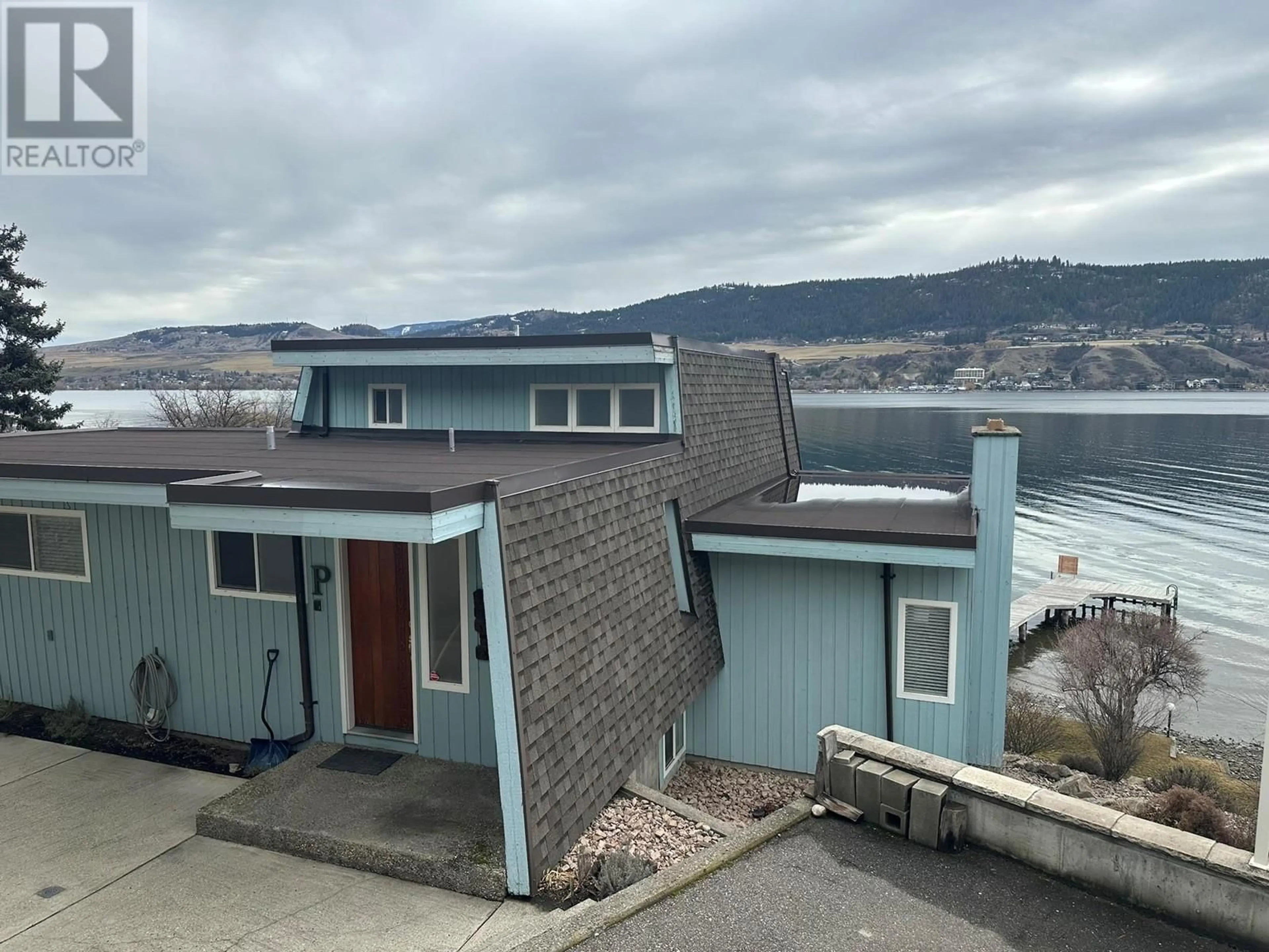 A pic from outside/outdoor area/front of a property/back of a property/a pic from drone, water/lake/river/ocean view for 7870 TRONSON ROAD, Vernon British Columbia V1H1C6