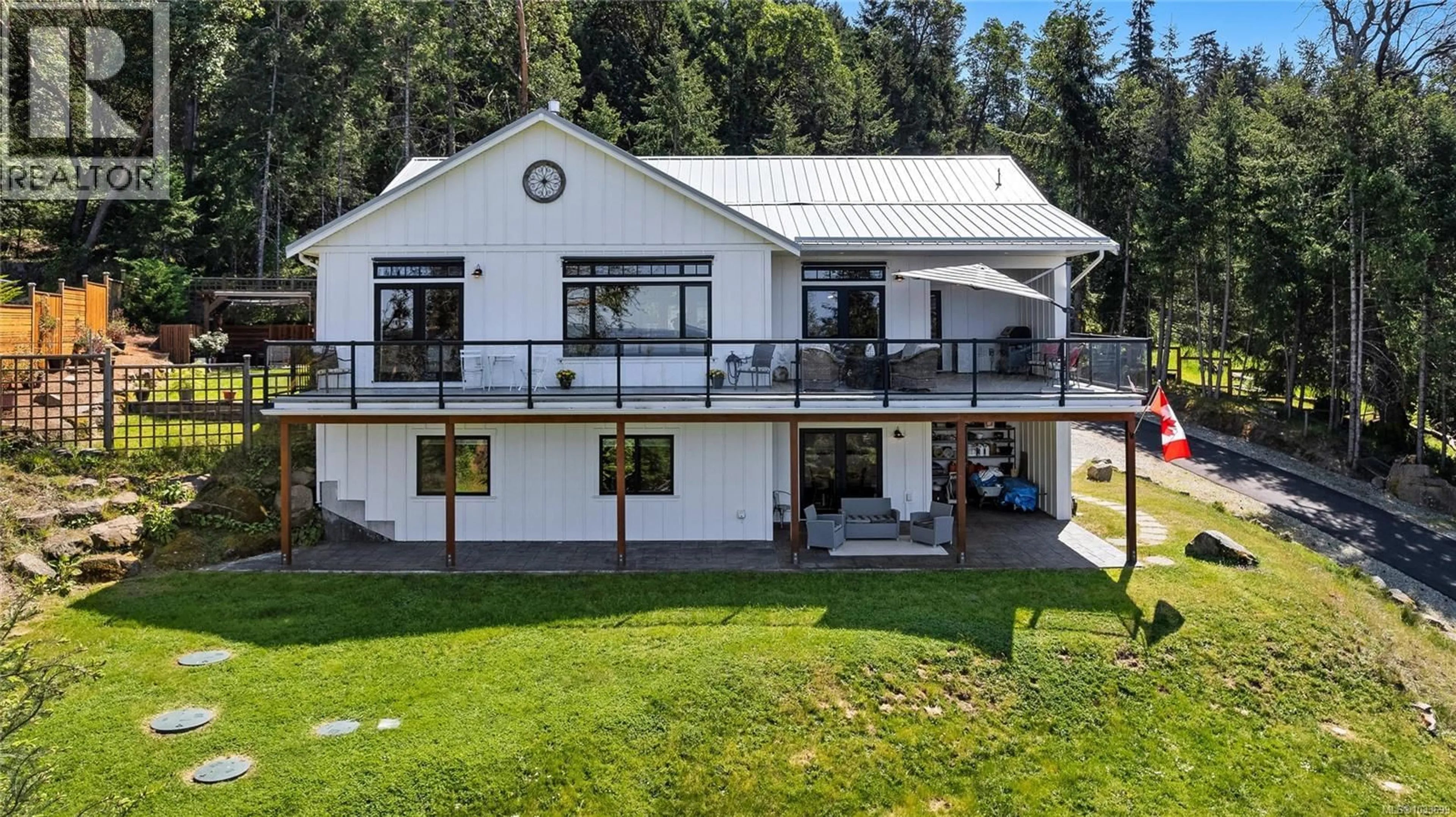 A pic from outside/outdoor area/front of a property/back of a property/a pic from drone, building for 347 COLLINS ROAD, Salt Spring British Columbia V8K2N1