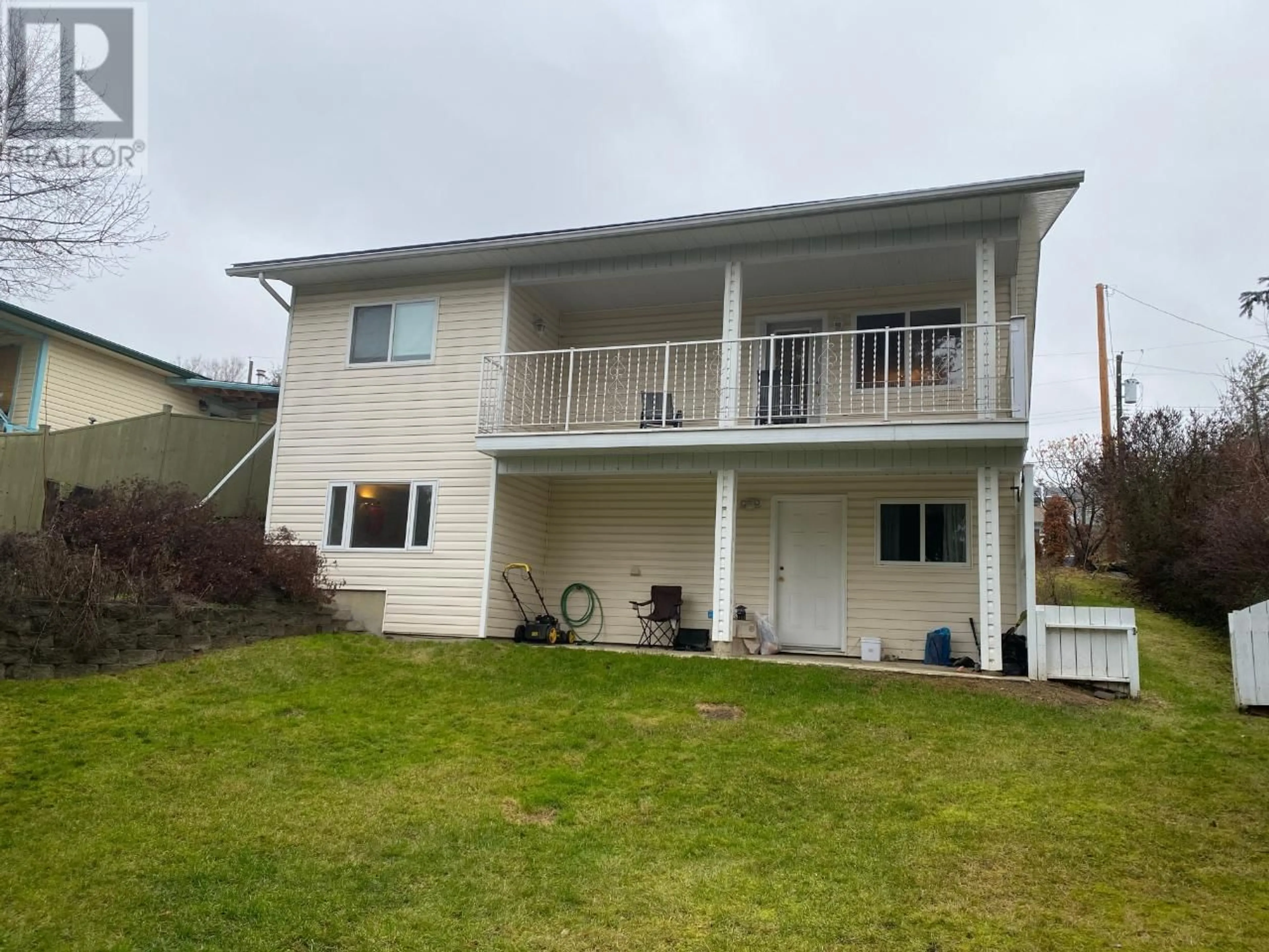 A pic from outside/outdoor area/front of a property/back of a property/a pic from drone, unknown for 615 6th Avenue, Creston British Columbia V0B1G3