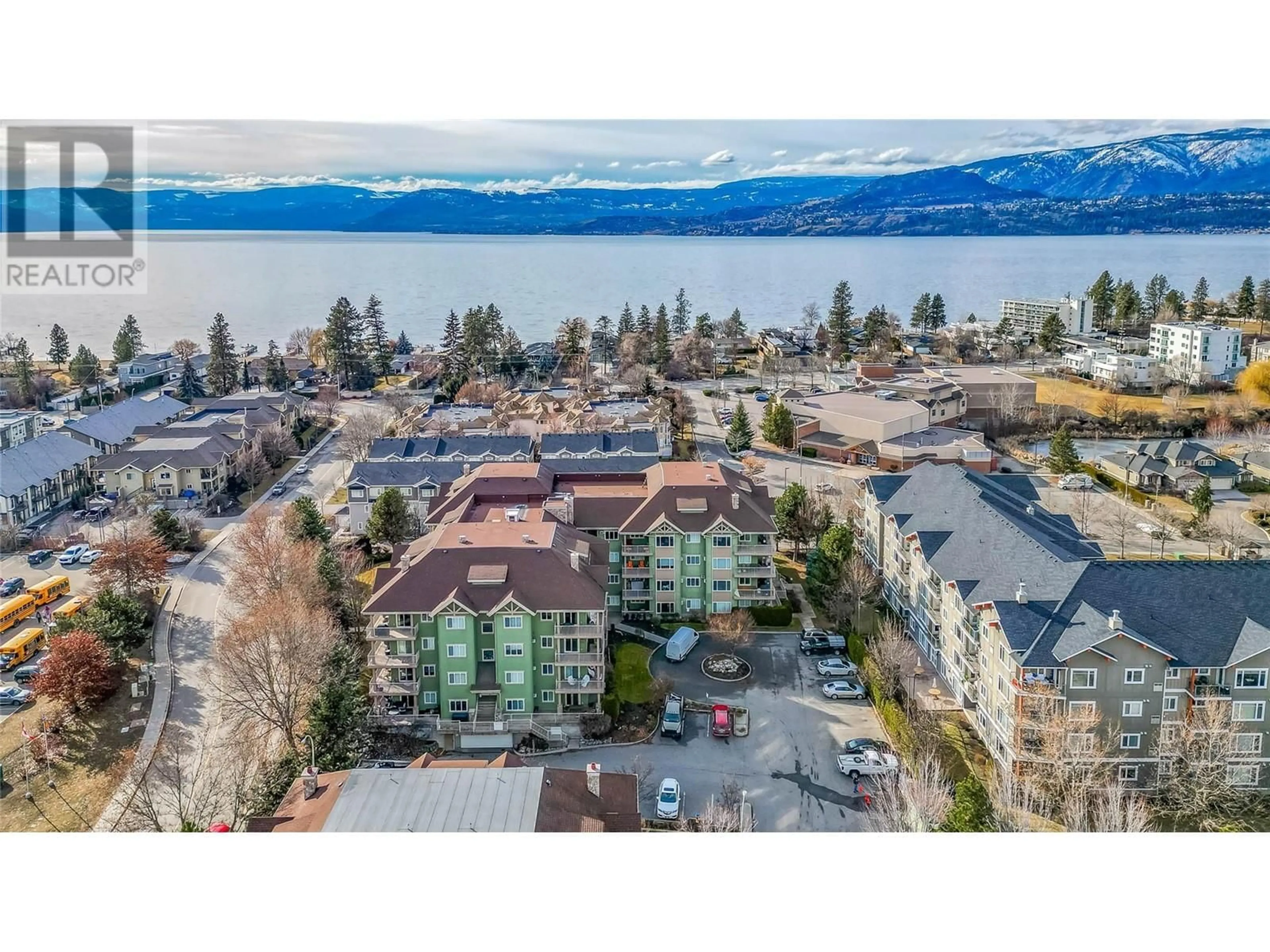 A pic from outside/outdoor area/front of a property/back of a property/a pic from drone, water/lake/river/ocean view for 680 Lequime Road Unit# 101, Kelowna British Columbia V1W1A4