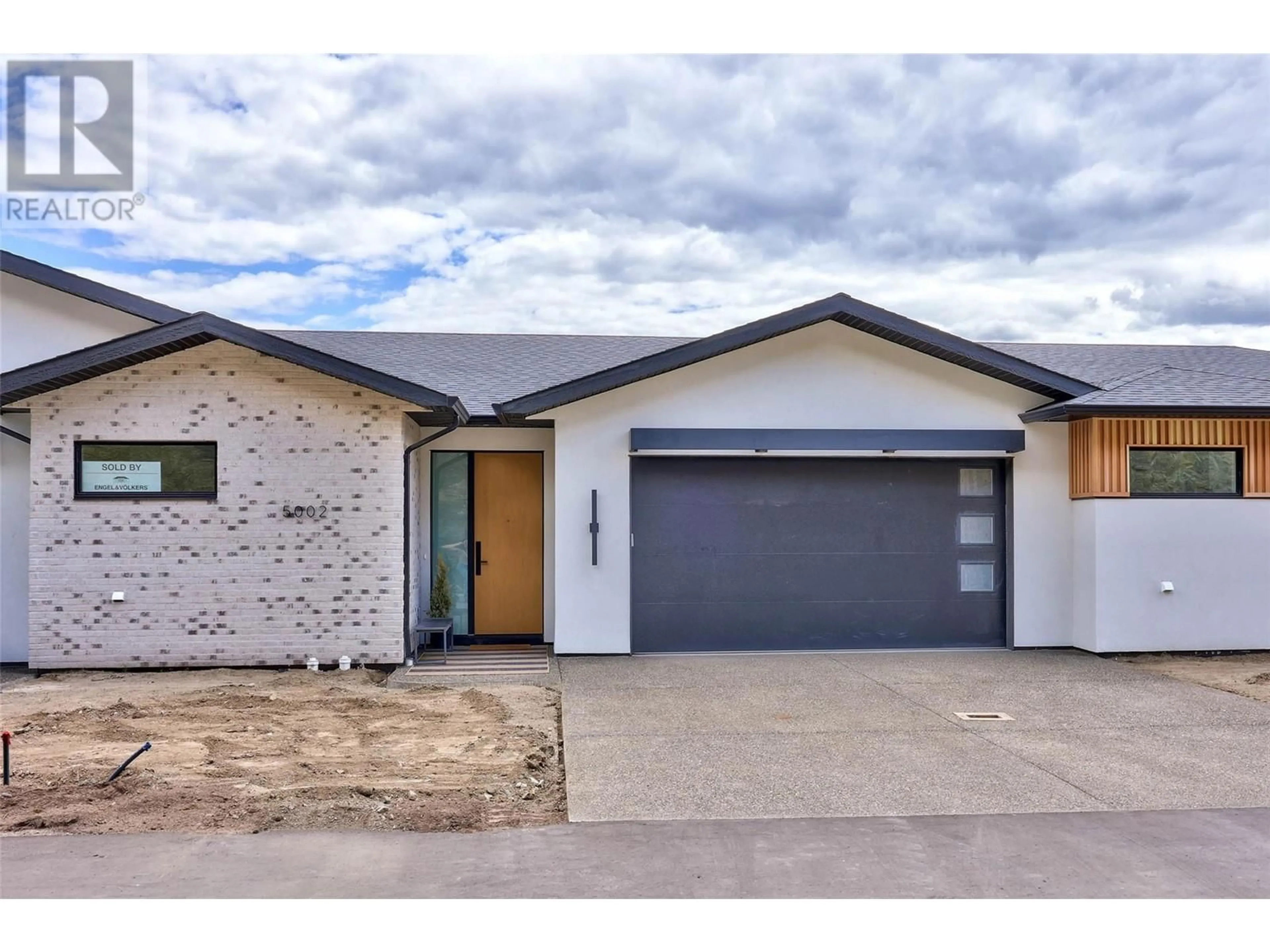 Home with brick exterior material, street for 5034 SUN RIVERS DRIVE, Kamloops British Columbia V2H0E7