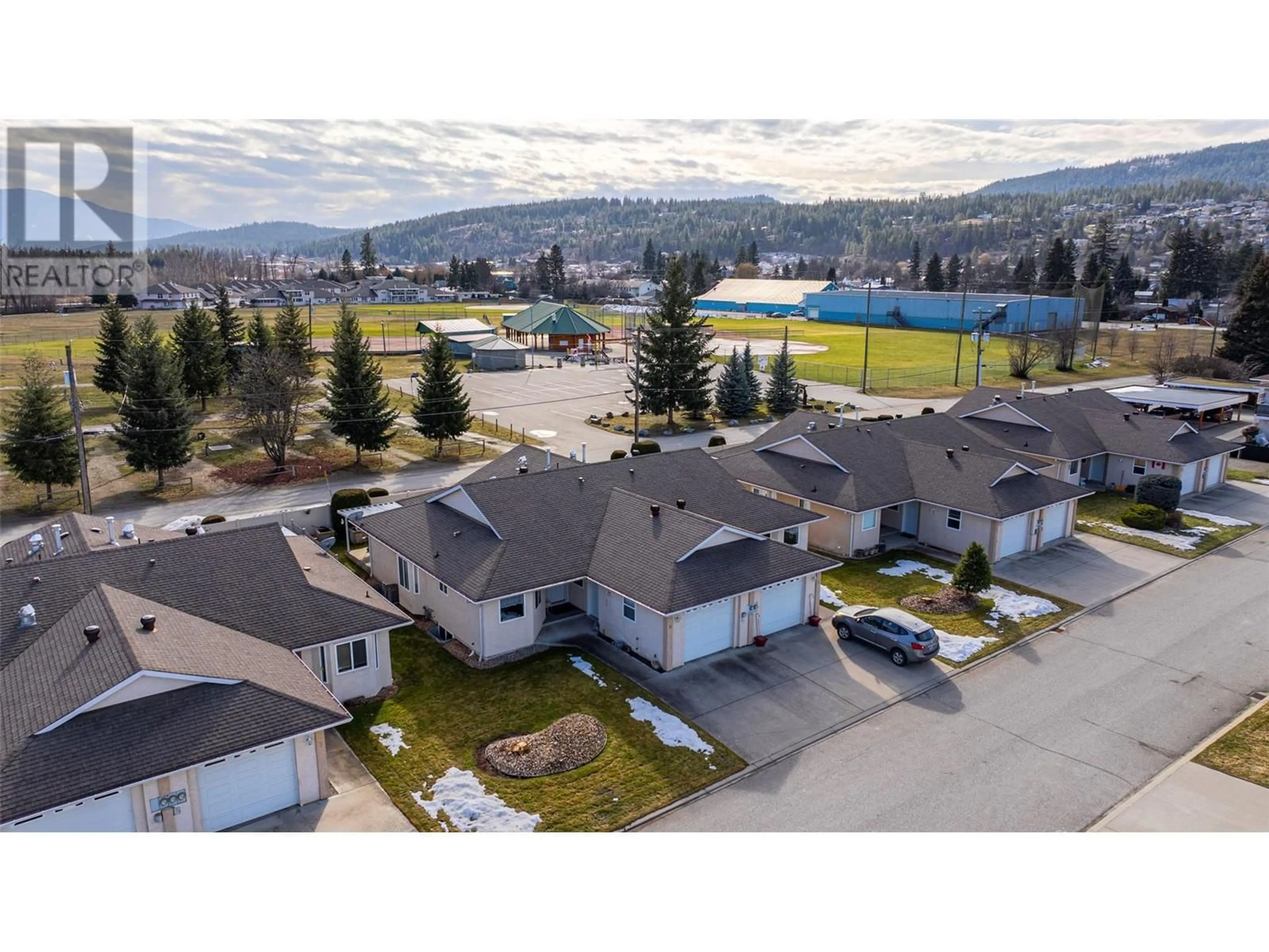 A pic from outside/outdoor area/front of a property/back of a property/a pic from drone, mountain view for 201 Kildonan Avenue Unit# 4, Enderby British Columbia V0E1V2