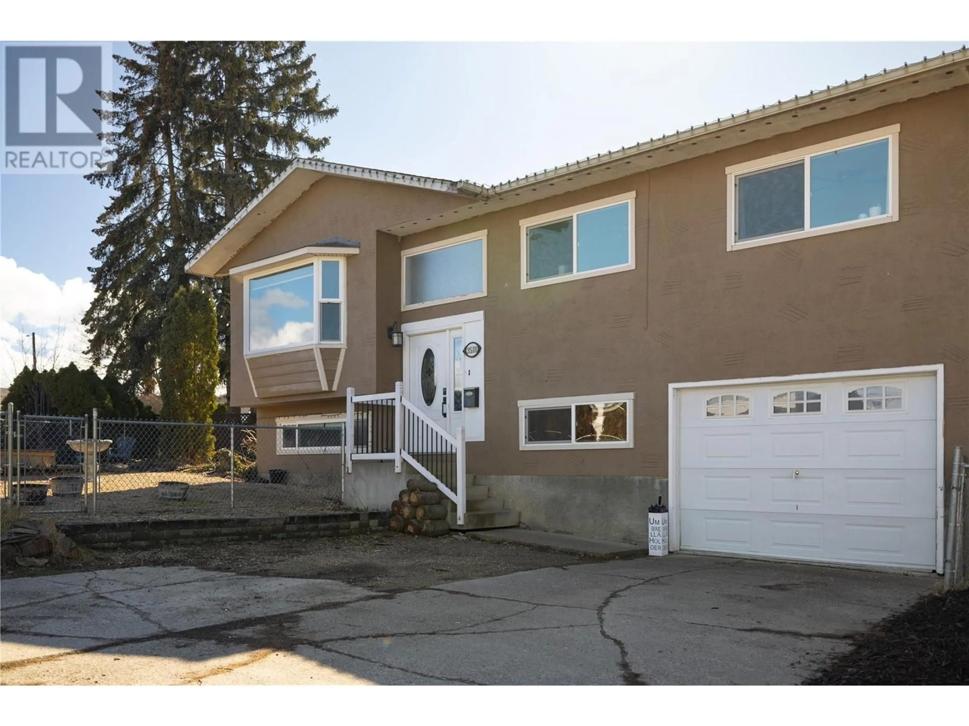 Home with vinyl exterior material, street for 3518 42 Avenue, Vernon British Columbia V1T6S5