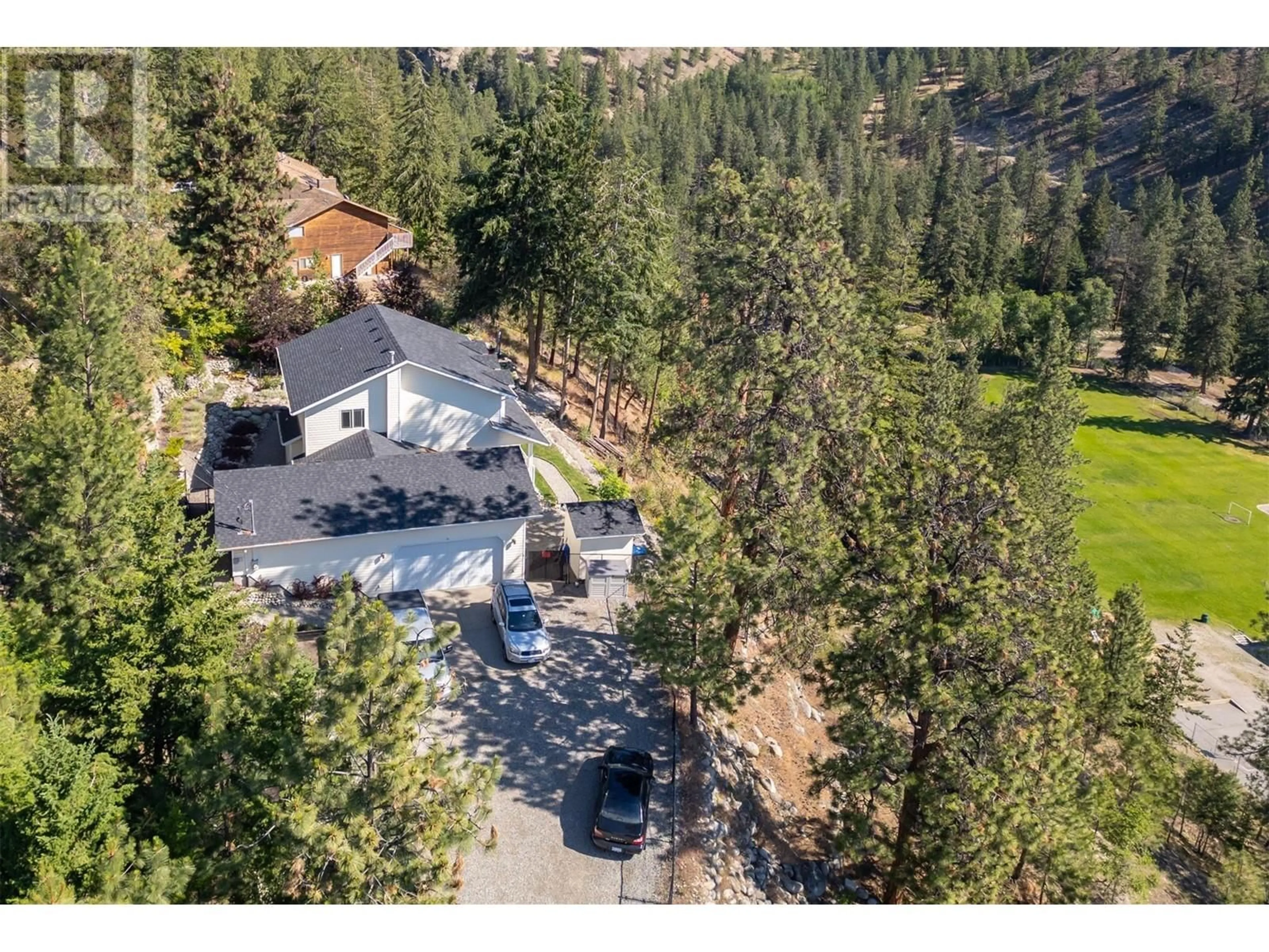 A pic from outside/outdoor area/front of a property/back of a property/a pic from drone, unknown for 4123 PONDEROSA DRIVE, Peachland British Columbia V0H1X5