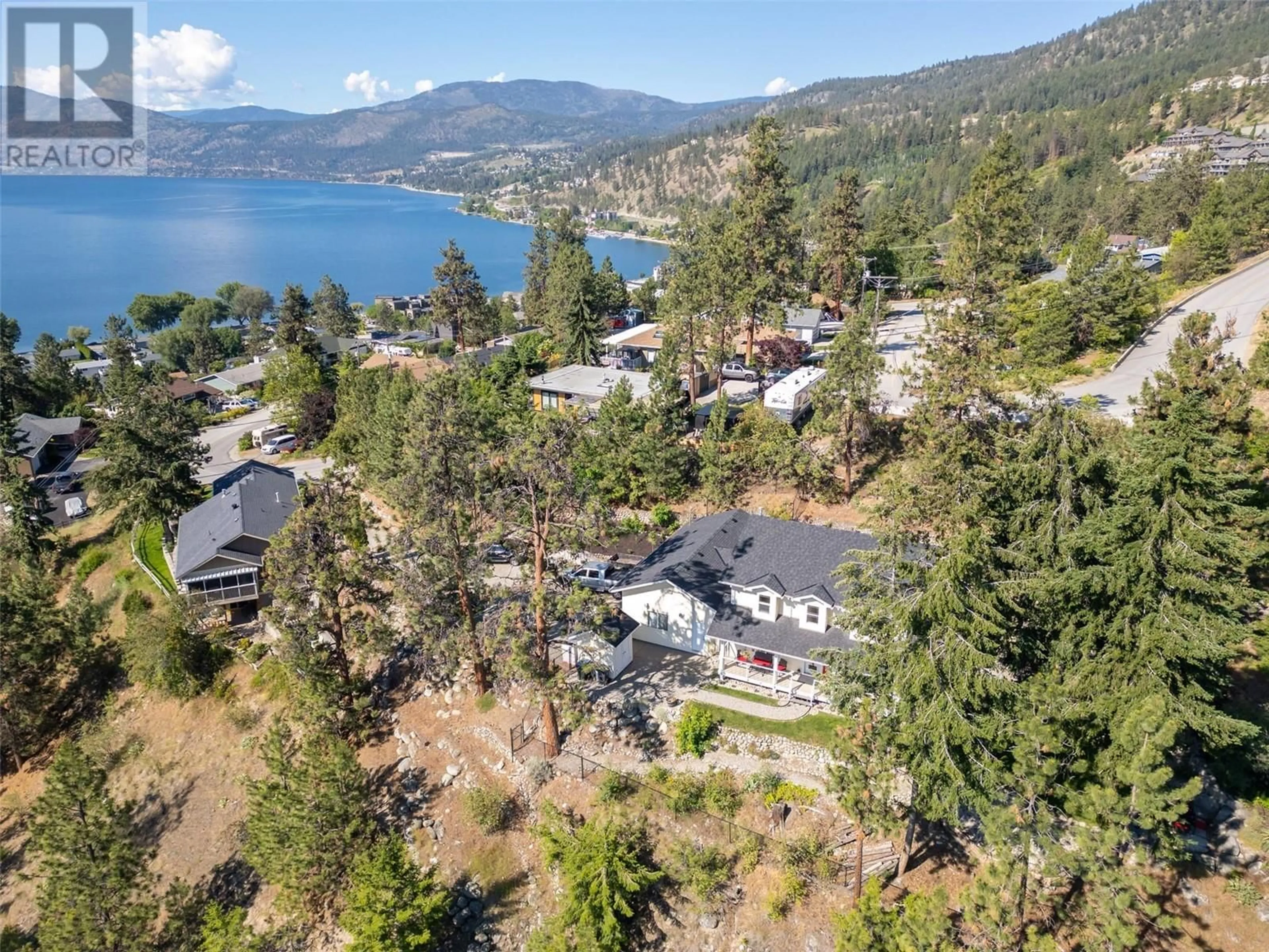A pic from outside/outdoor area/front of a property/back of a property/a pic from drone, water/lake/river/ocean view for 4123 PONDEROSA DRIVE, Peachland British Columbia V0H1X5