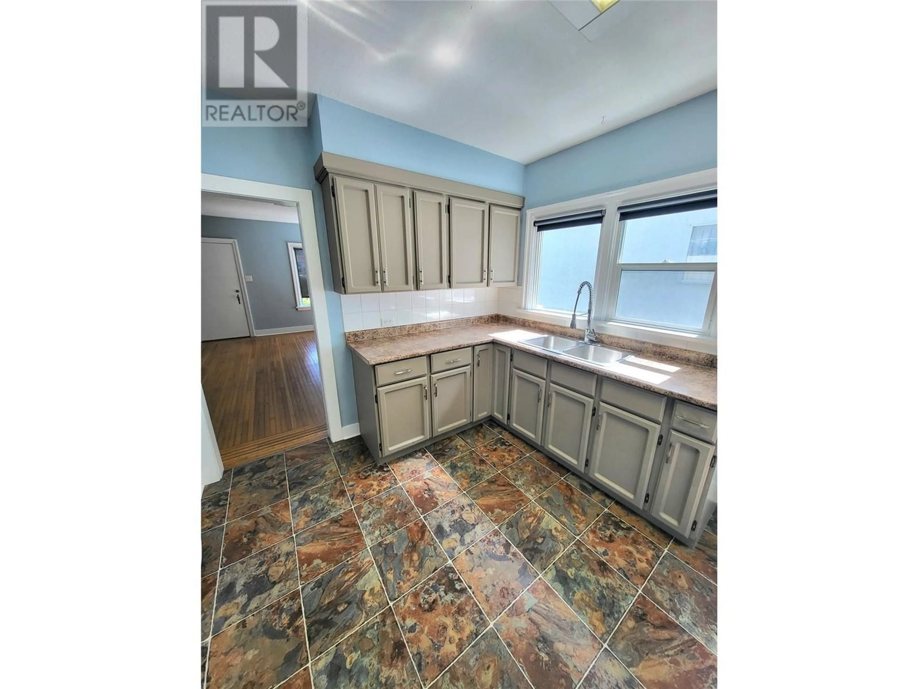 Standard kitchen, ceramic/tile floor for 857 MAIN STREET, Penticton British Columbia V2A5E3