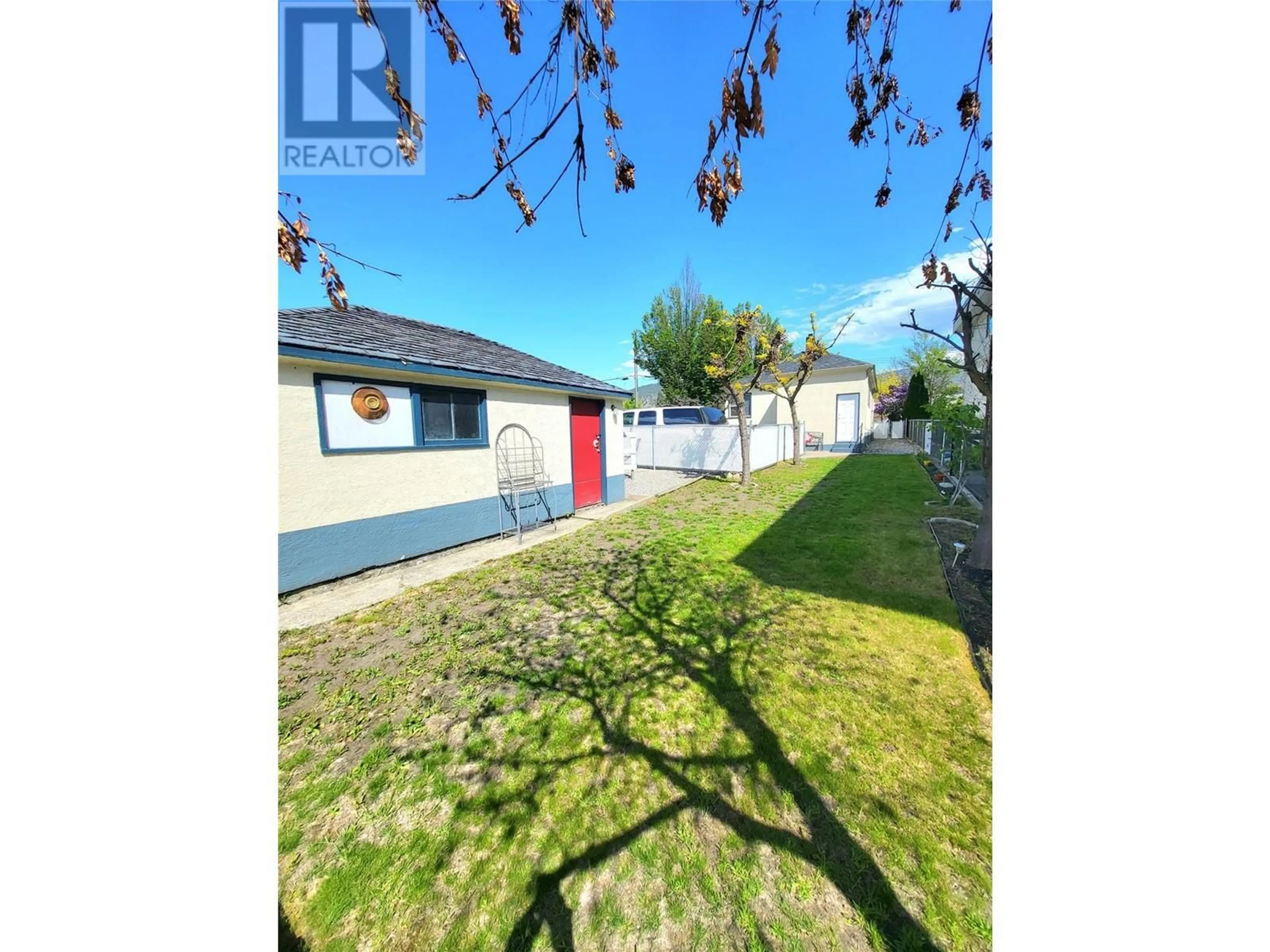 A pic from outside/outdoor area/front of a property/back of a property/a pic from drone, street for 857 MAIN STREET, Penticton British Columbia V2A5E3