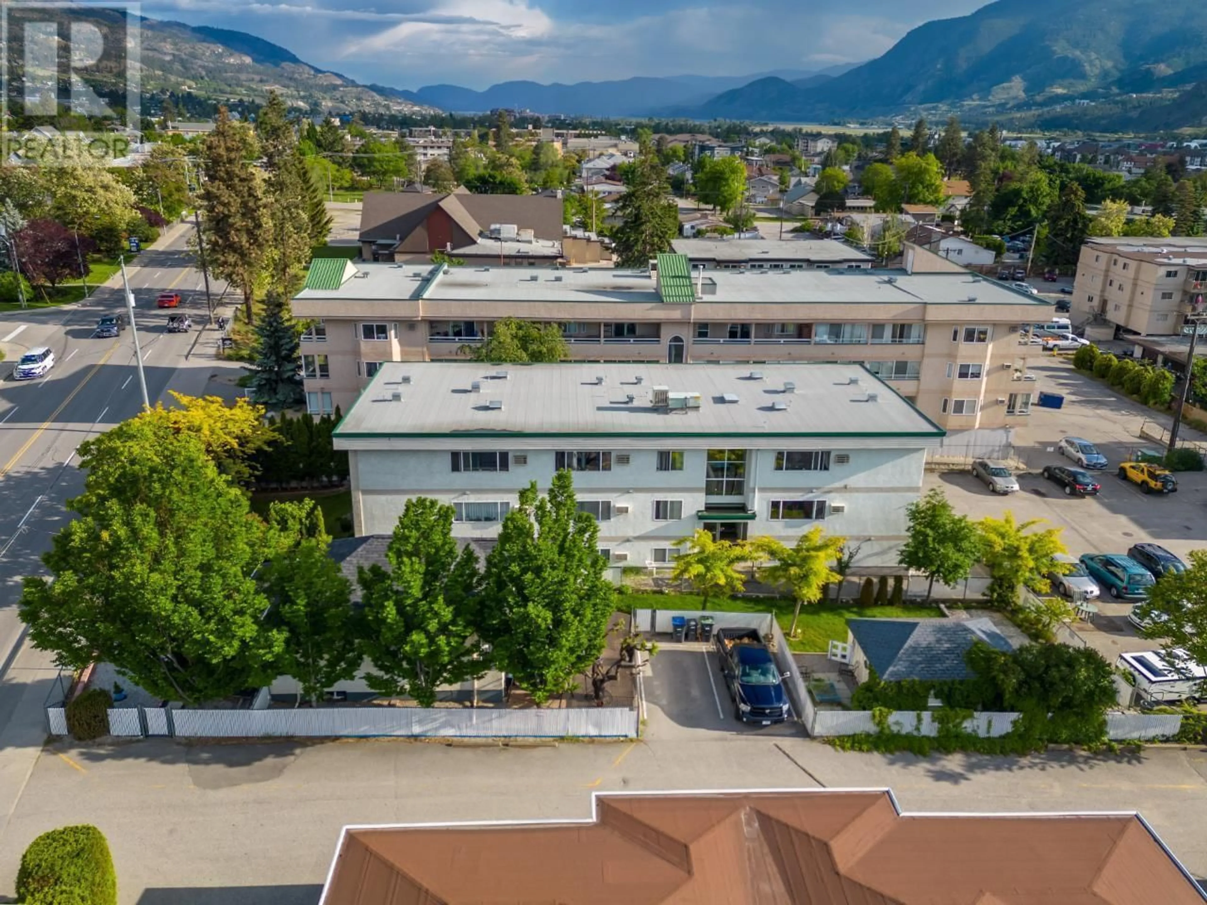 A pic from outside/outdoor area/front of a property/back of a property/a pic from drone, mountain view for 857 Main Street, Penticton British Columbia V2A5E3