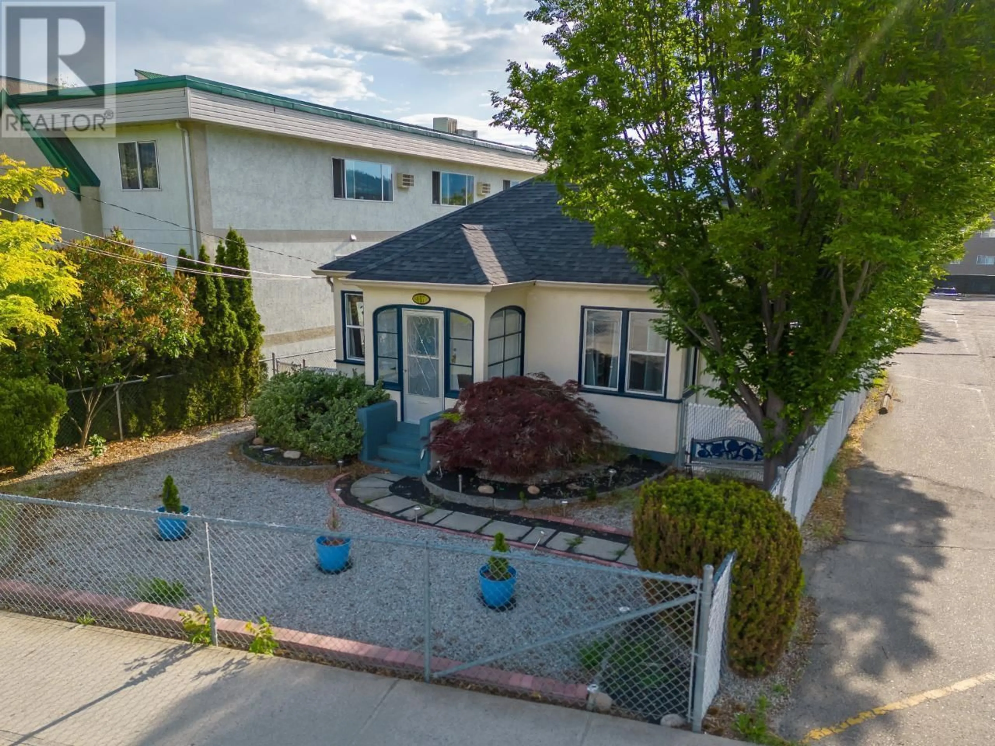 A pic from outside/outdoor area/front of a property/back of a property/a pic from drone, street for 857 Main Street, Penticton British Columbia V2A5E3