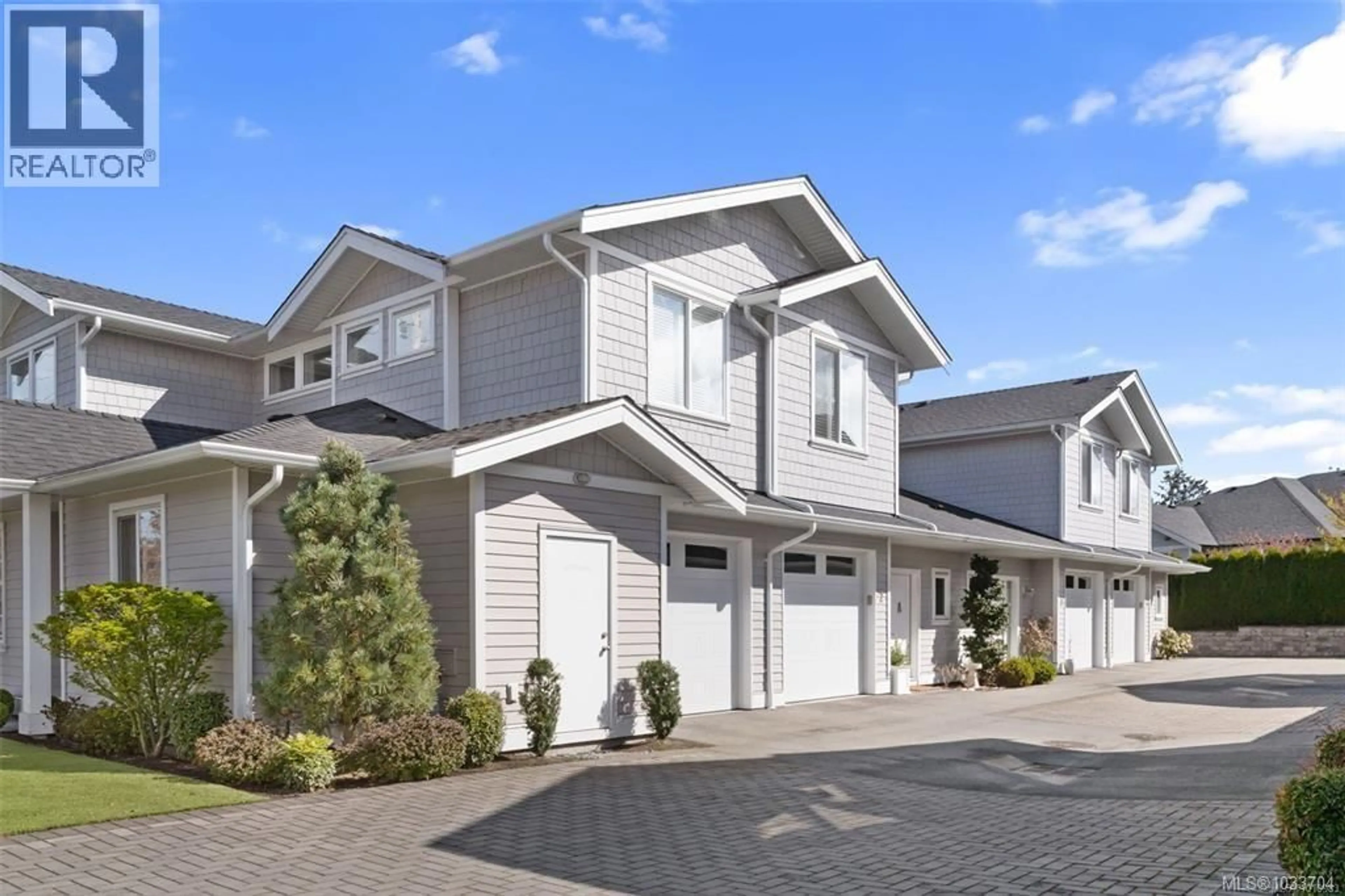 Home with vinyl exterior material, street for 3 - 10490 RESTHAVEN DRIVE, Sidney British Columbia V8L3H7