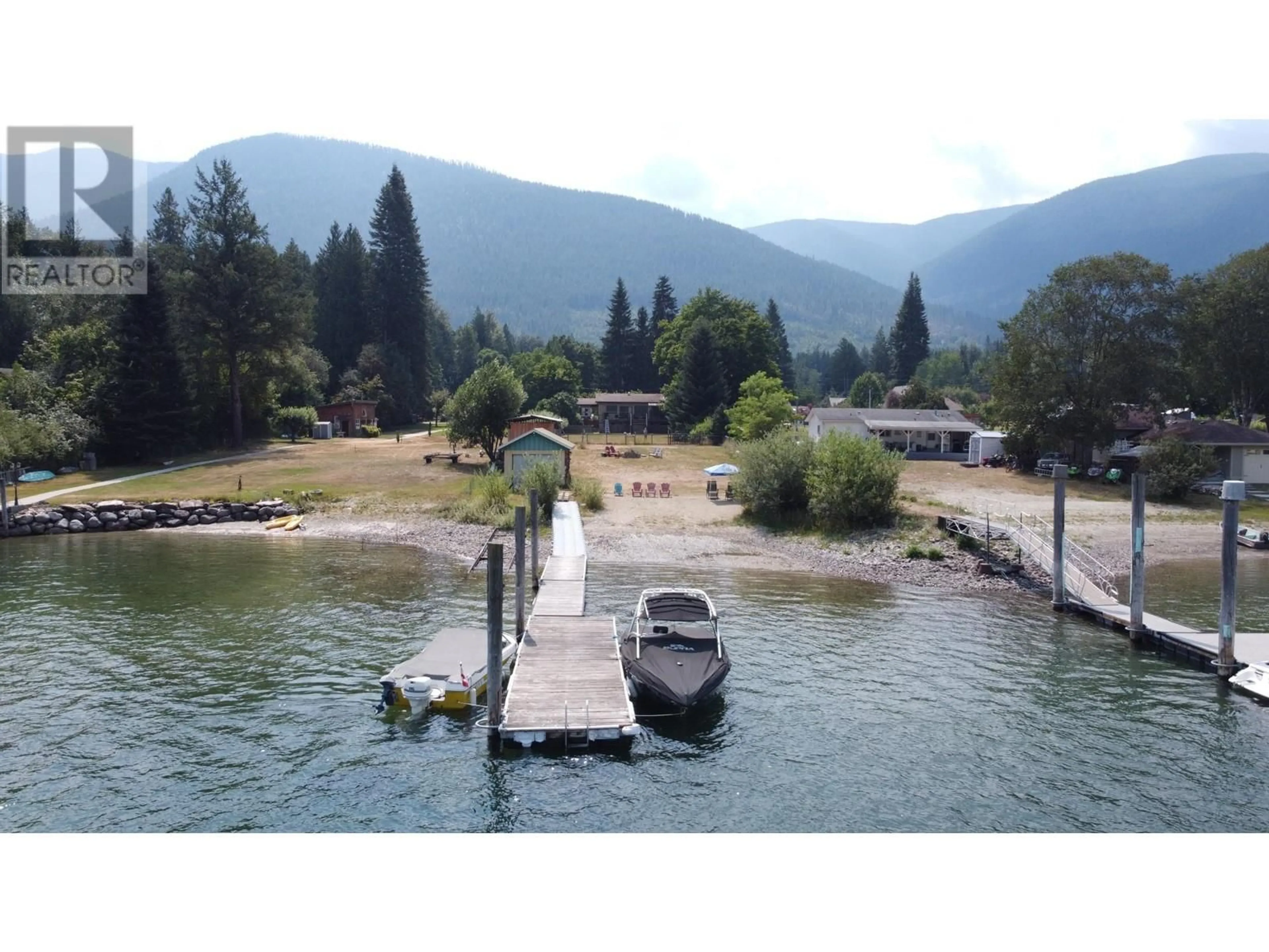 A pic from outside/outdoor area/front of a property/back of a property/a pic from drone, water/lake/river/ocean view for 6171 ROWLEY Road, Harrop British Columbia V1L6P7