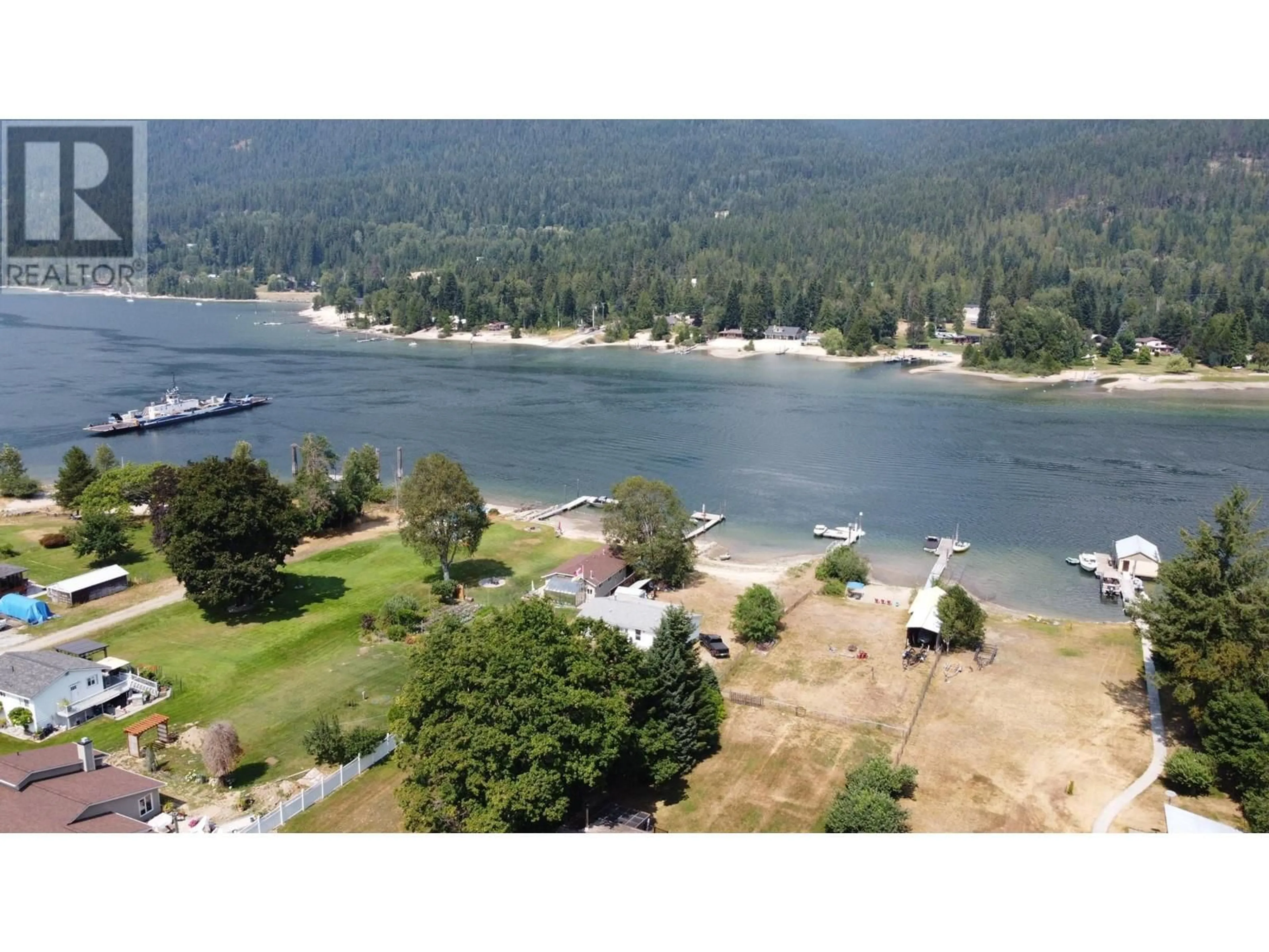 A pic from outside/outdoor area/front of a property/back of a property/a pic from drone, water/lake/river/ocean view for 6171 ROWLEY Road, Harrop British Columbia V1L6P7