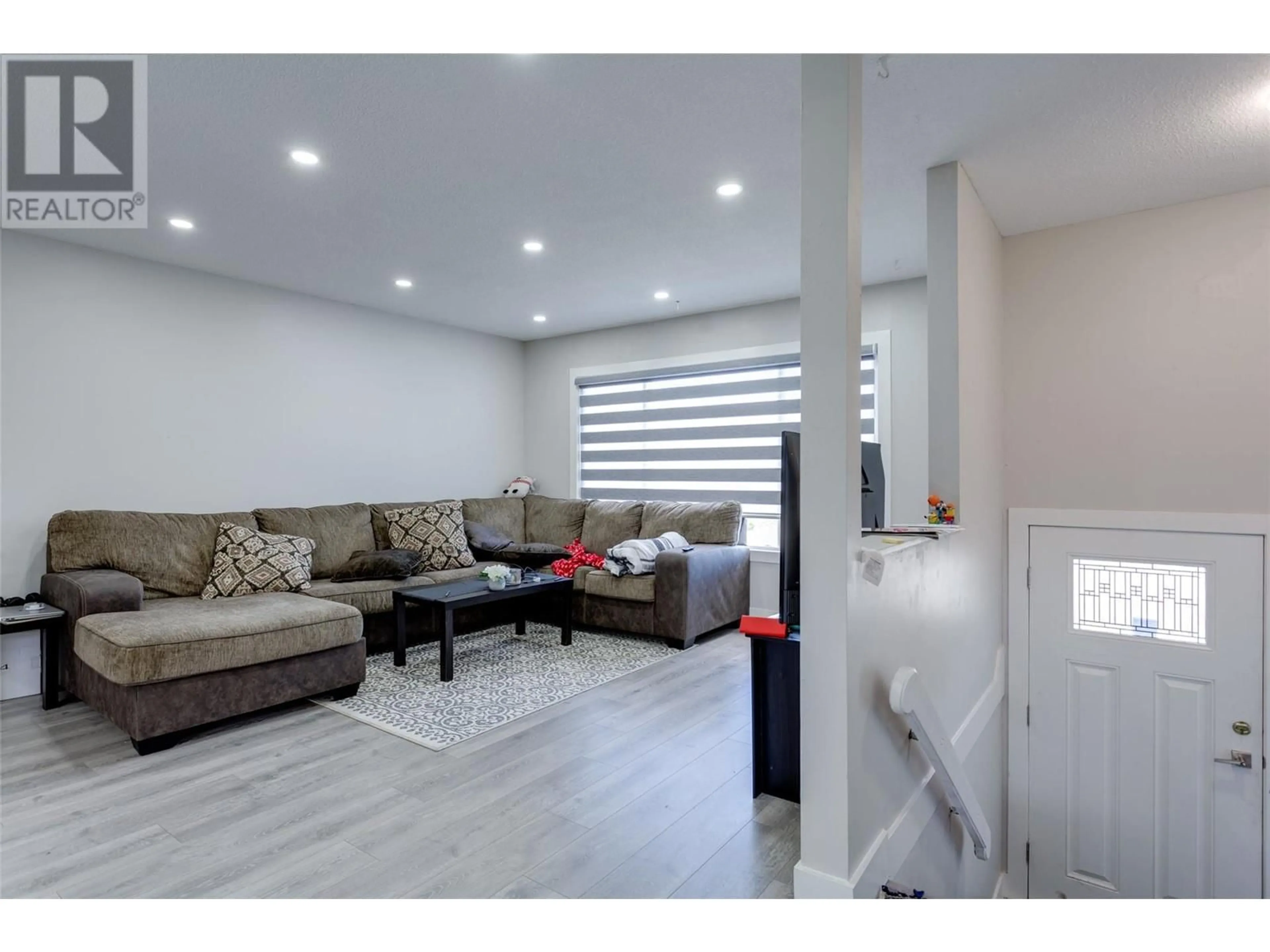 Living room with furniture, unknown for 4210 17 AVENUE, Vernon British Columbia V1T7K8