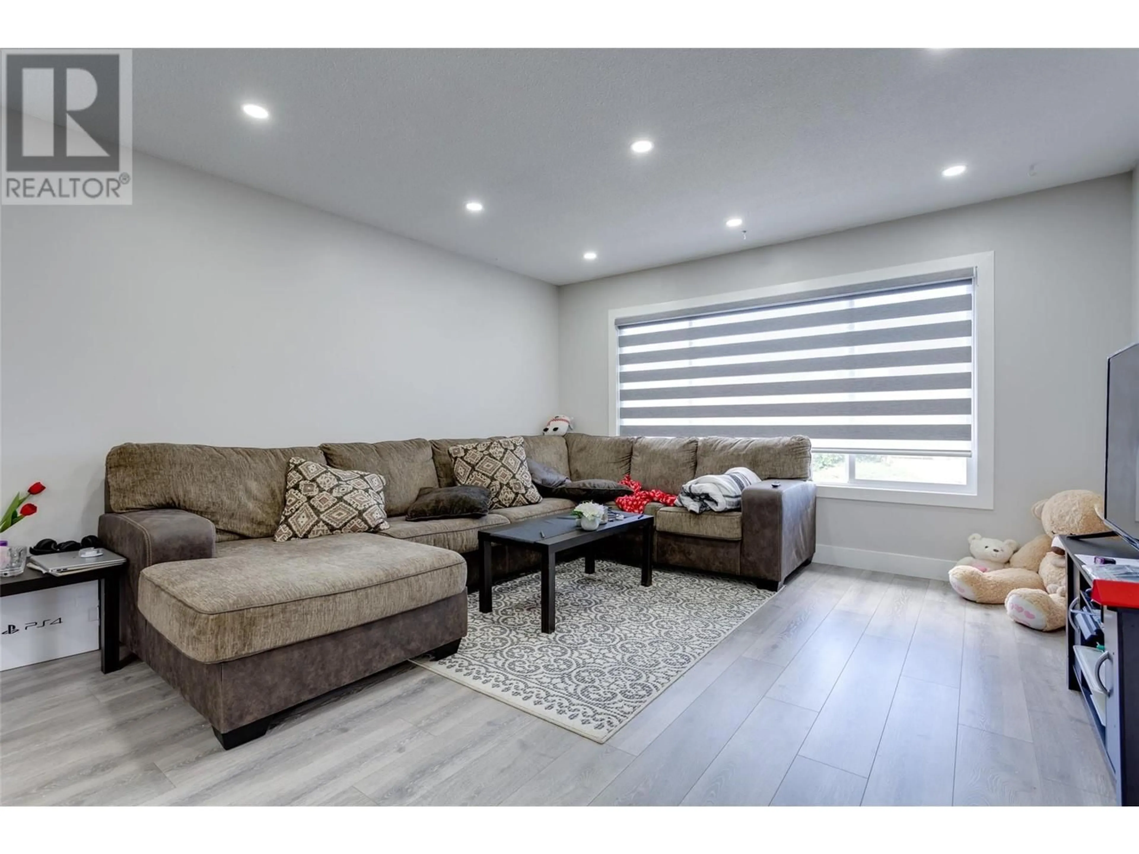 Living room with furniture, unknown for 4210 17 AVENUE, Vernon British Columbia V1T7K8
