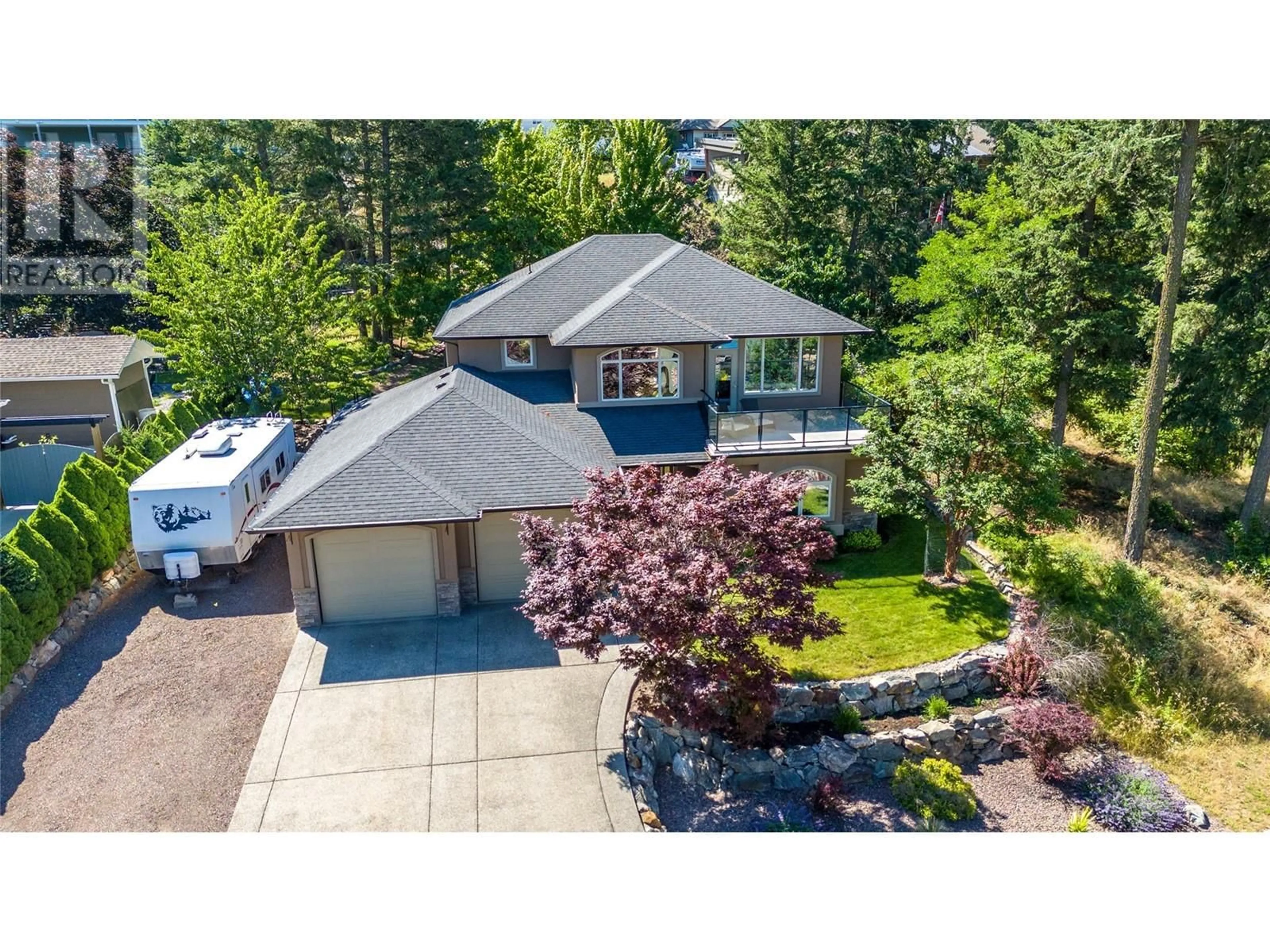 A pic from outside/outdoor area/front of a property/back of a property/a pic from drone, street for 40 Kestrel Place Unit# 30, Vernon British Columbia V1H1S6