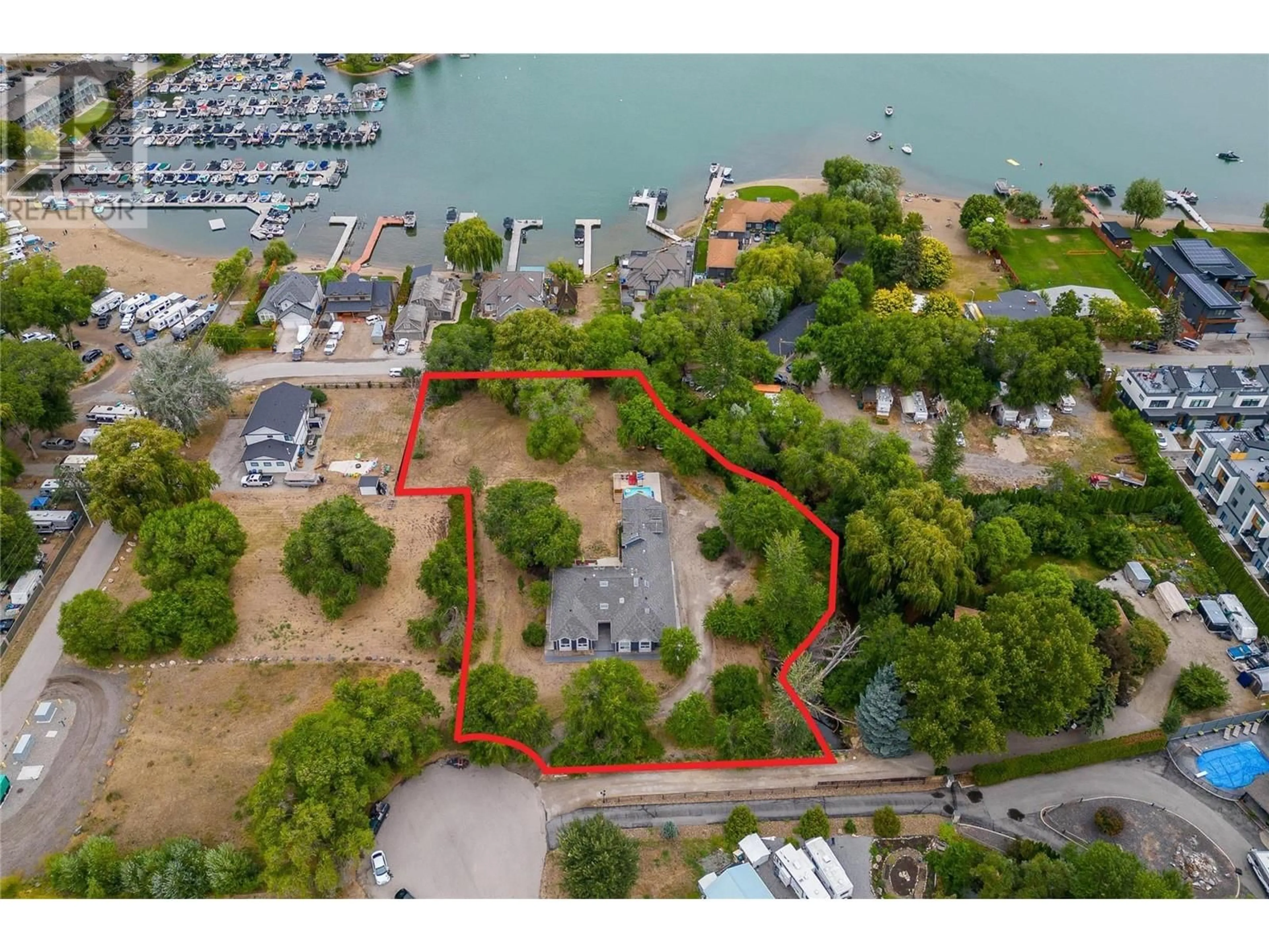 A pic from outside/outdoor area/front of a property/back of a property/a pic from drone, water/lake/river/ocean view for 11591 TURTLE BAY COURT, Lake Country British Columbia V4V1X9