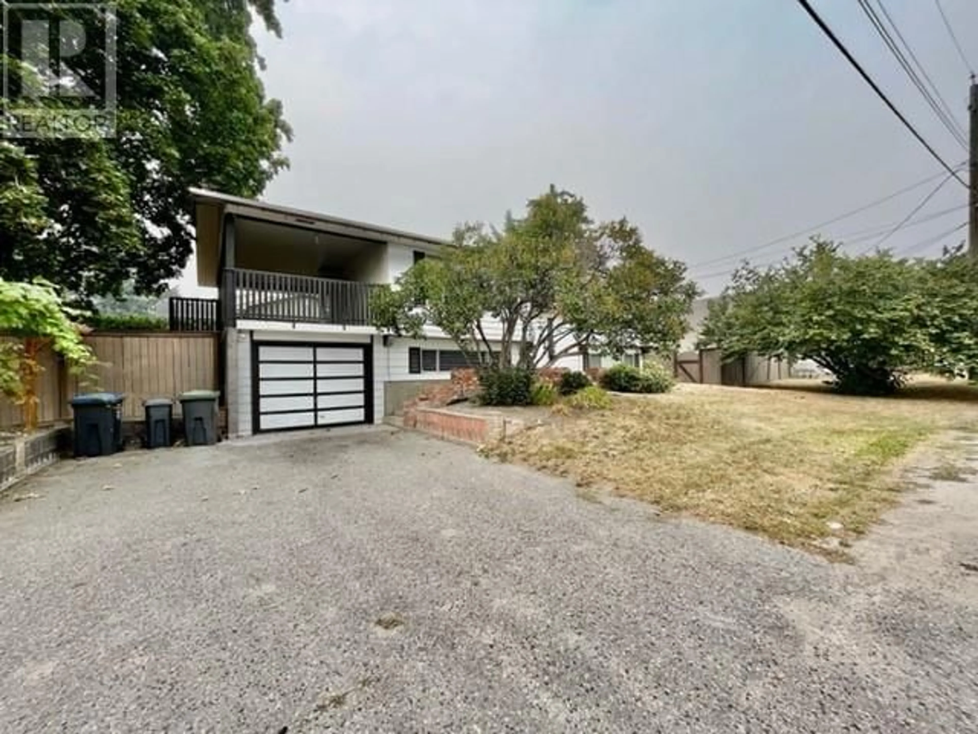 A pic from outside/outdoor area/front of a property/back of a property/a pic from drone, street for 3720 HOSKINS ROAD, West Kelowna British Columbia V4T1K7