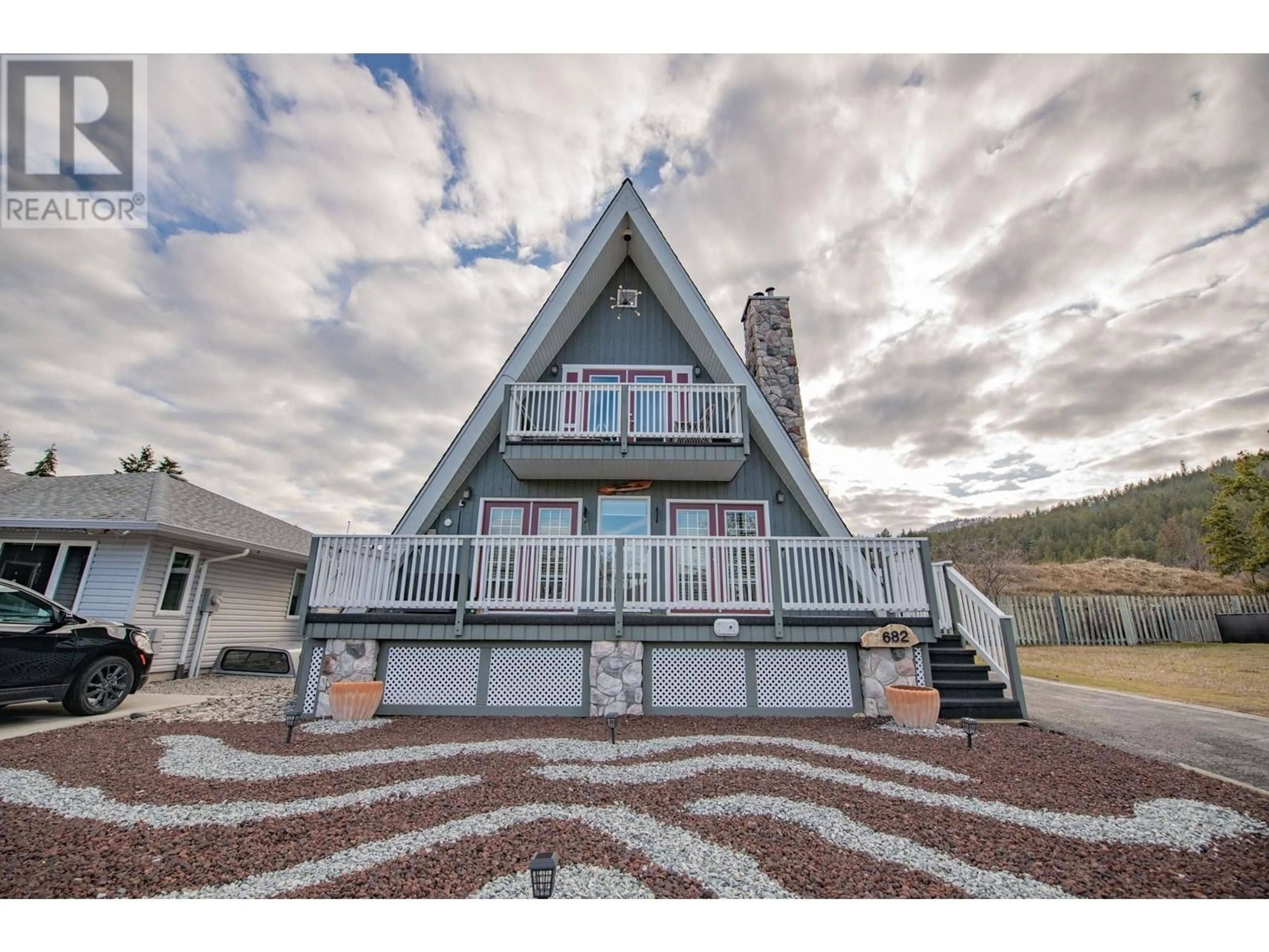 Home with vinyl exterior material, mountain view for 682 COUGAR STREET, Vernon British Columbia V1H2A1