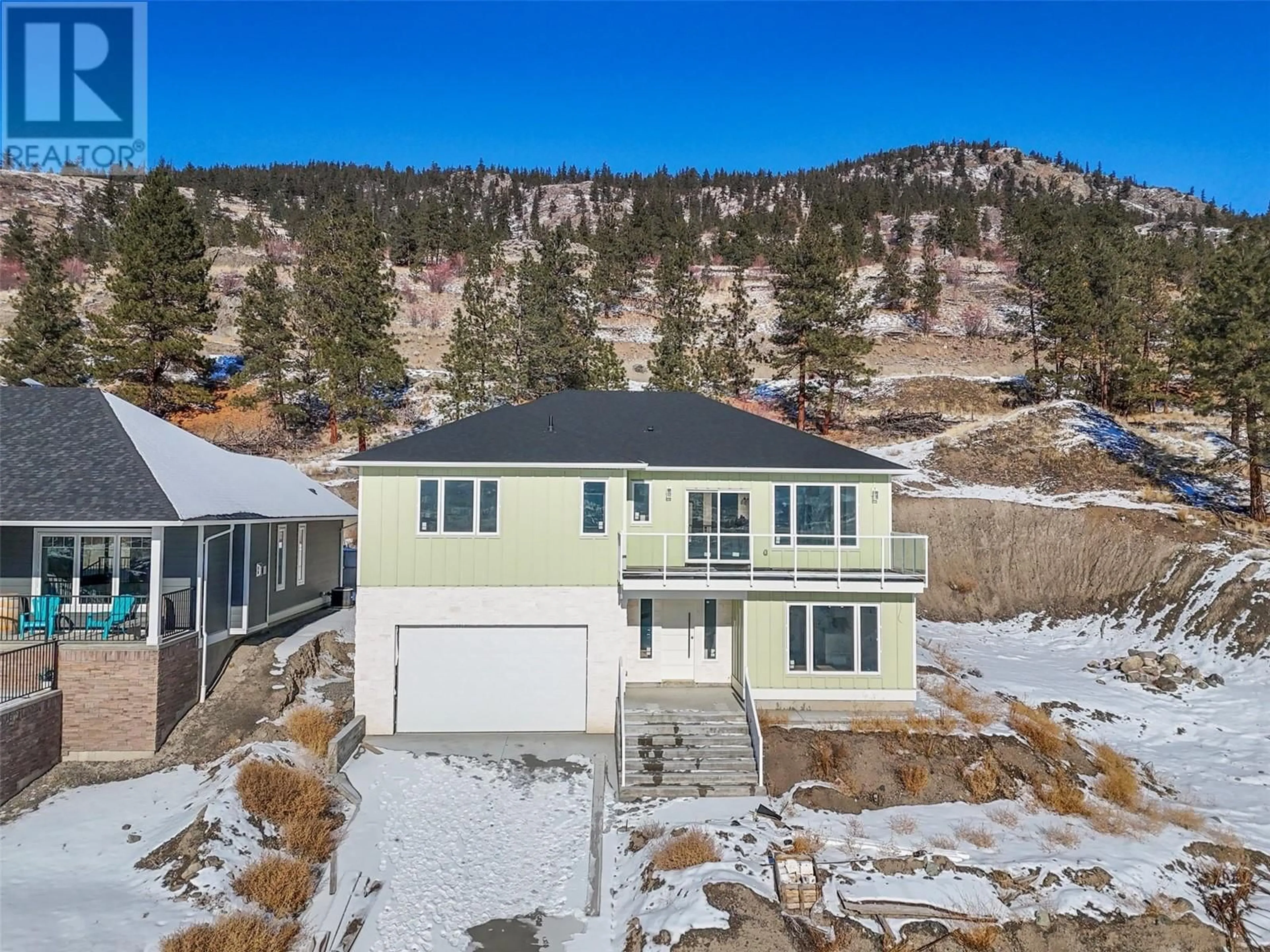 A pic from outside/outdoor area/front of a property/back of a property/a pic from drone, mountain view for 2755 Peregrine Way, Merritt British Columbia V1K0B4