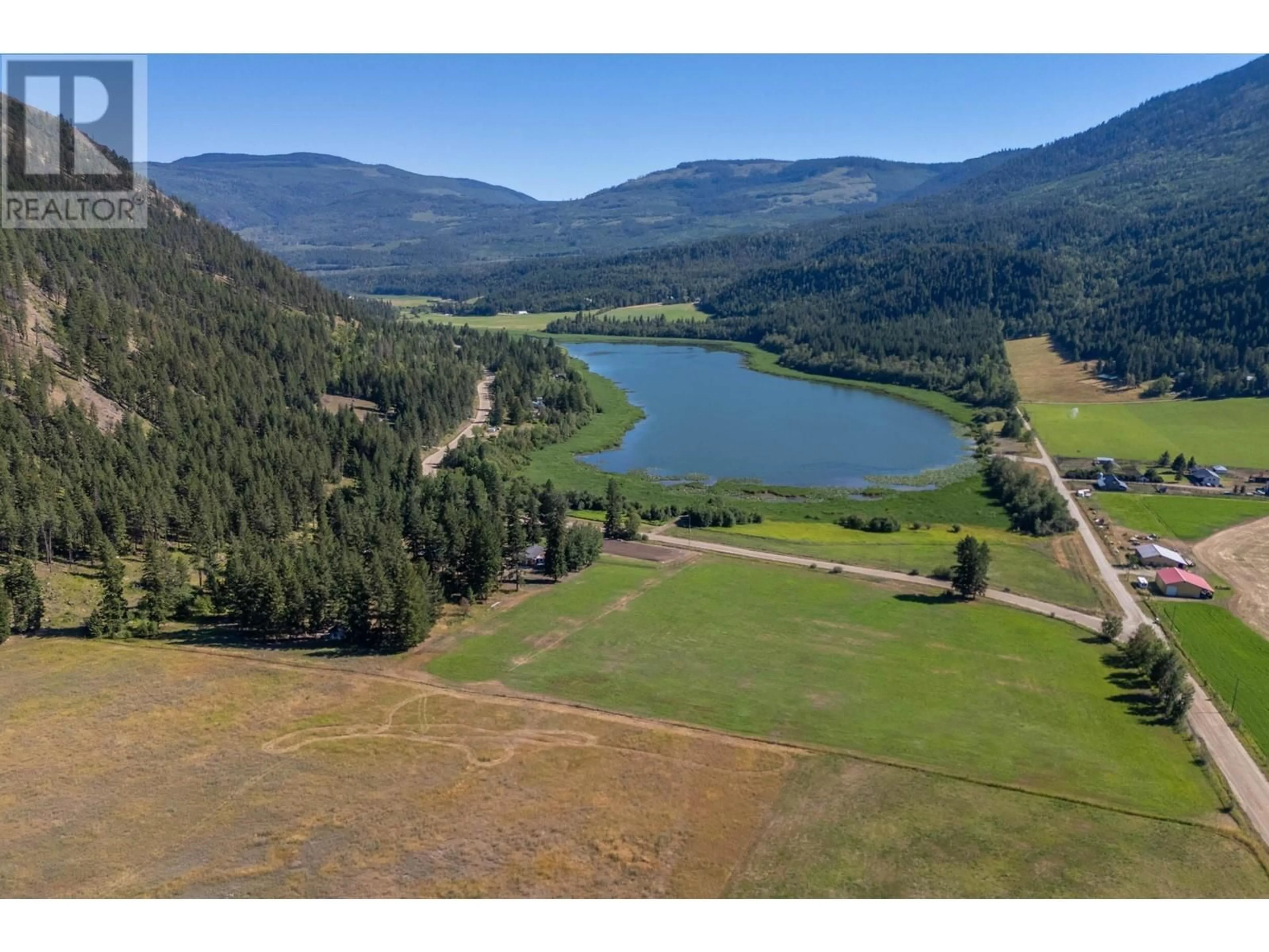 A pic from outside/outdoor area/front of a property/back of a property/a pic from drone, water/lake/river/ocean view for 8661 SKIMIKIN ROAD, Chase British Columbia V0E1M1