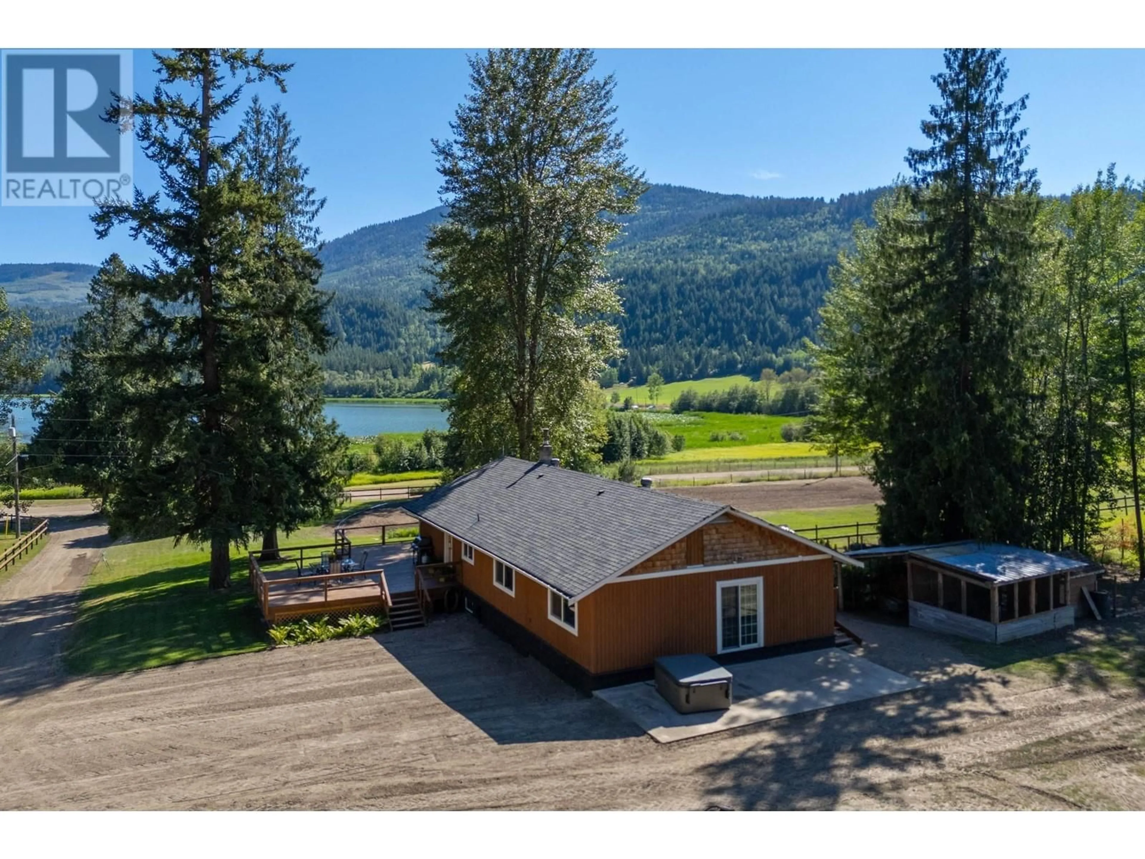 A pic from outside/outdoor area/front of a property/back of a property/a pic from drone, water/lake/river/ocean view for 8661 SKIMIKIN ROAD, Chase British Columbia V0E1M1