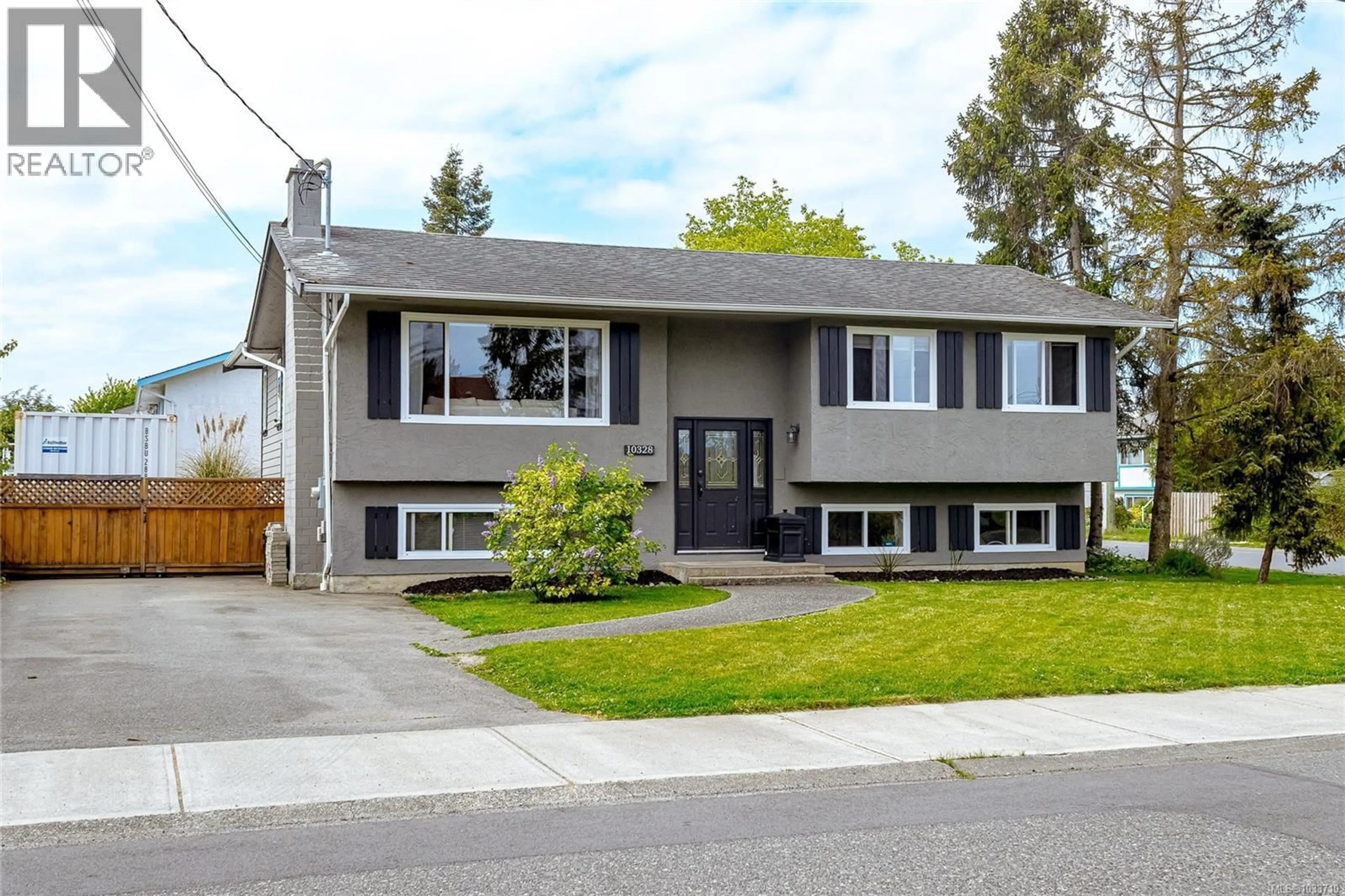 Home with vinyl exterior material, street for 10328 BOWERBANK ROAD, Sidney British Columbia V8L3L4