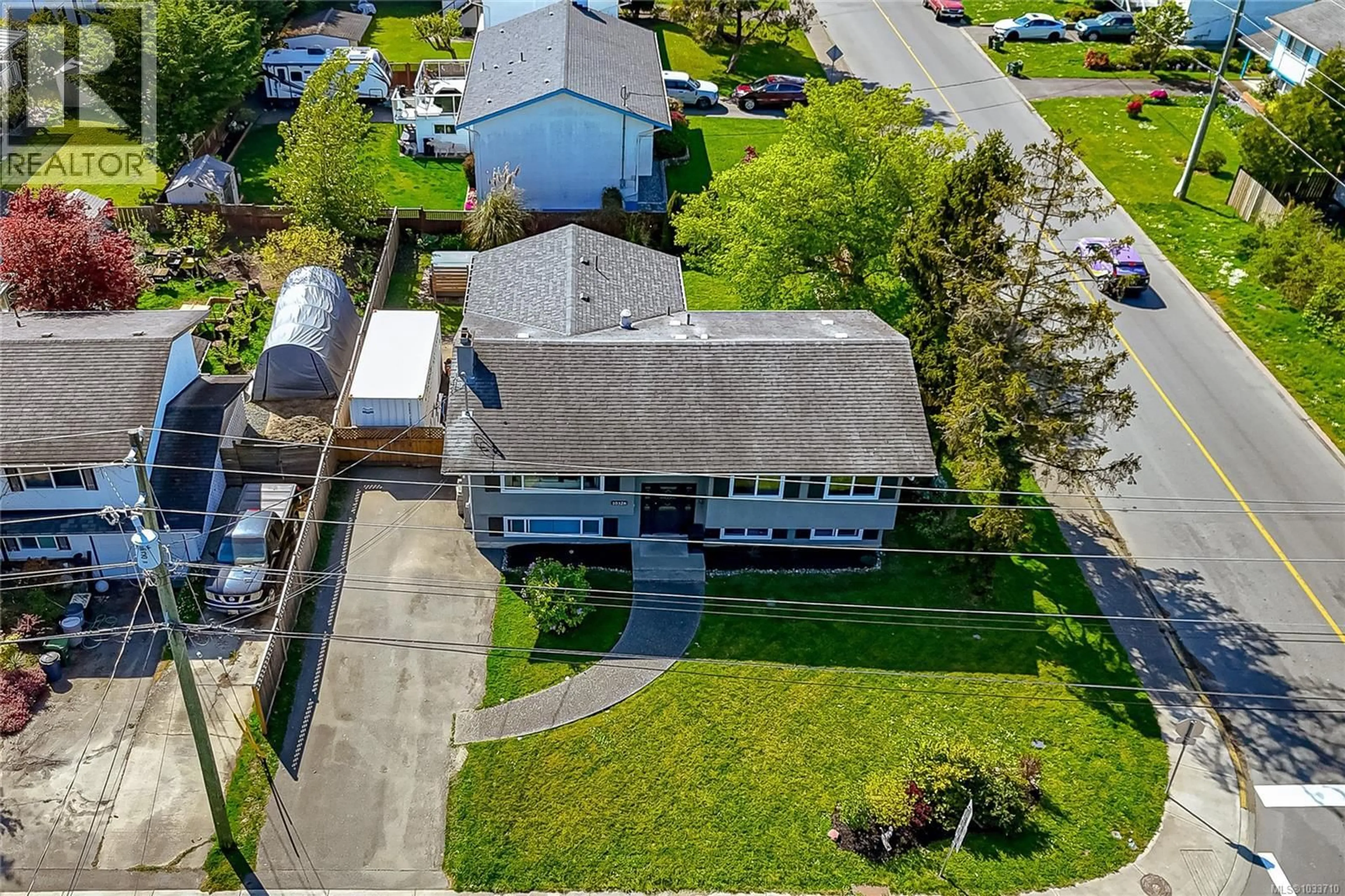 A pic from outside/outdoor area/front of a property/back of a property/a pic from drone, street for 10328 BOWERBANK ROAD, Sidney British Columbia V8L3L4