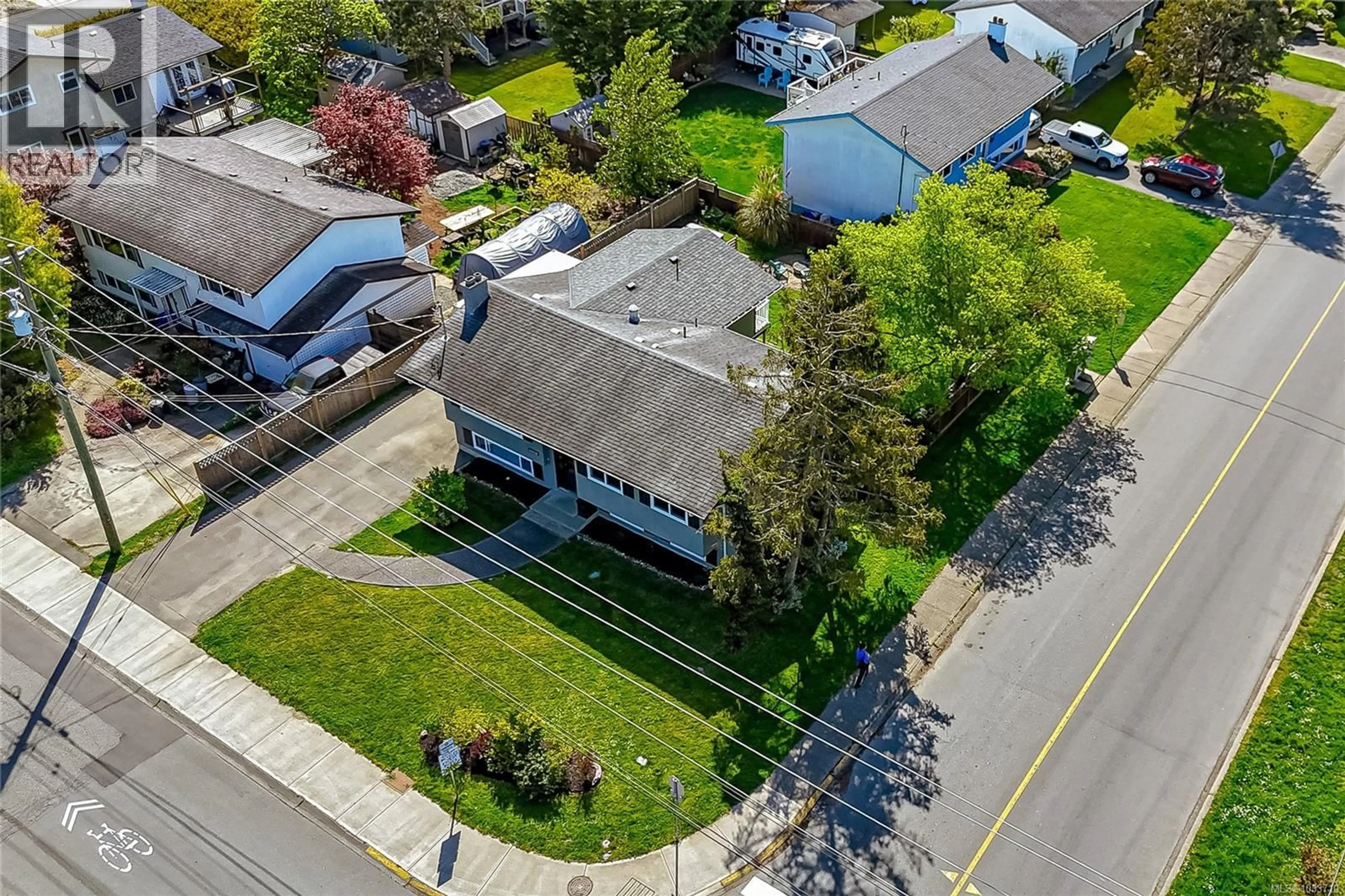 A pic from outside/outdoor area/front of a property/back of a property/a pic from drone, street for 10328 BOWERBANK ROAD, Sidney British Columbia V8L3L4