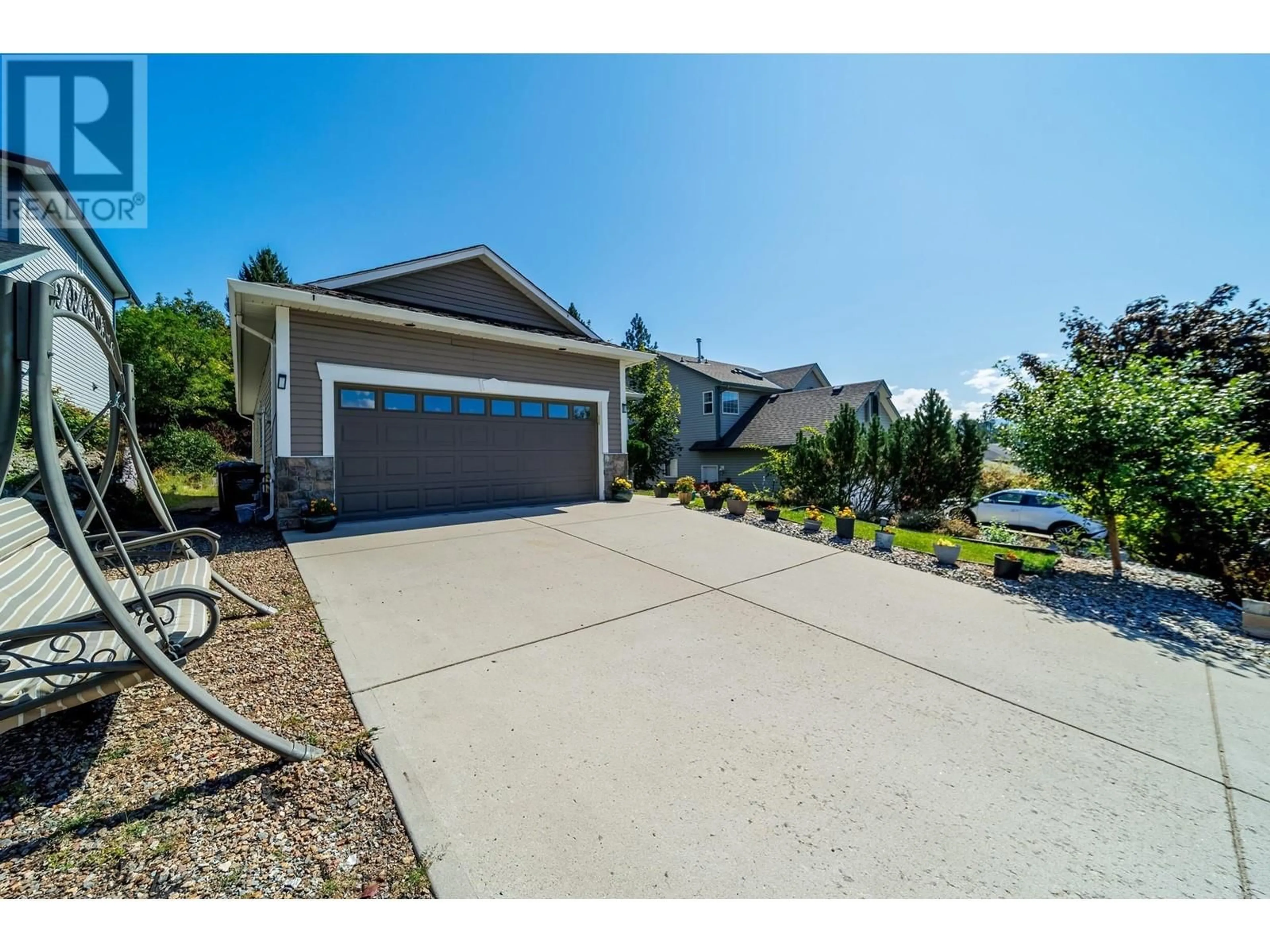 A pic from outside/outdoor area/front of a property/back of a property/a pic from drone, water/lake/river/ocean view for 2066 Rosefield Drive, West Kelowna British Columbia V1Z3Y8