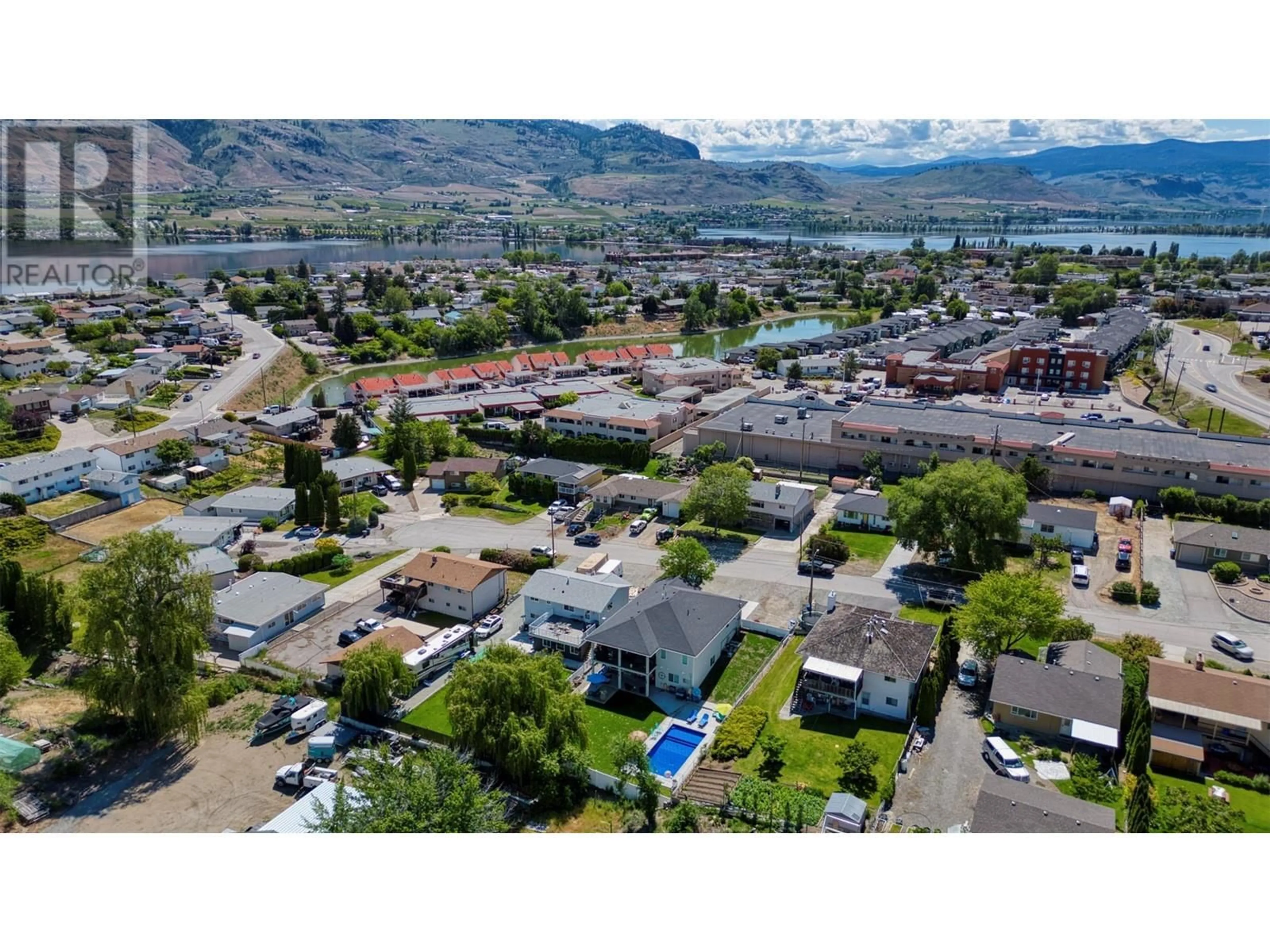 A pic from outside/outdoor area/front of a property/back of a property/a pic from drone, mountain view for 14 LAMBERT COURT, Osoyoos British Columbia V0H1V2