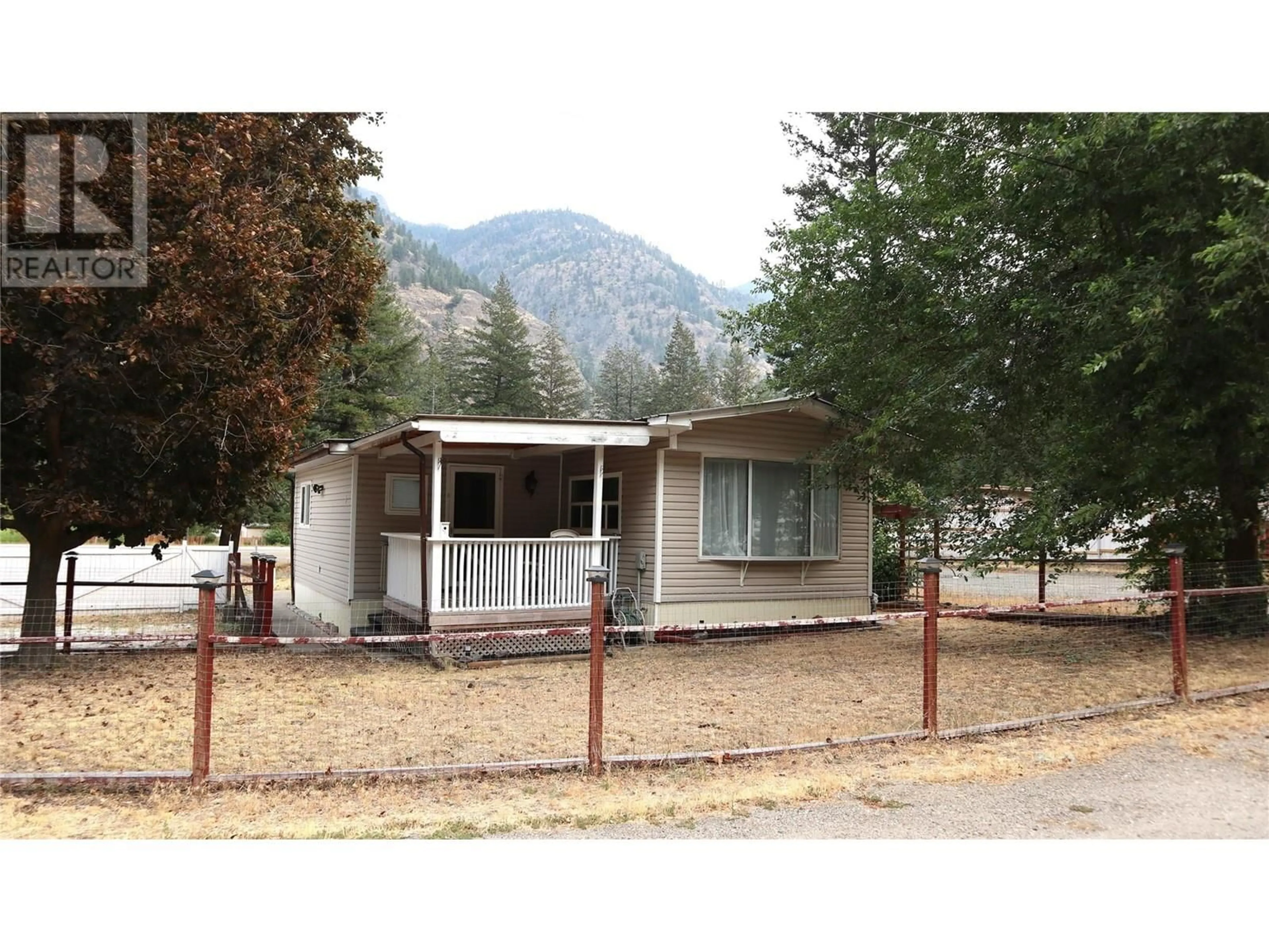 Home with vinyl exterior material, mountain view for 1 - 1514 HWY 3A OTHER, Olalla British Columbia V0X1N6