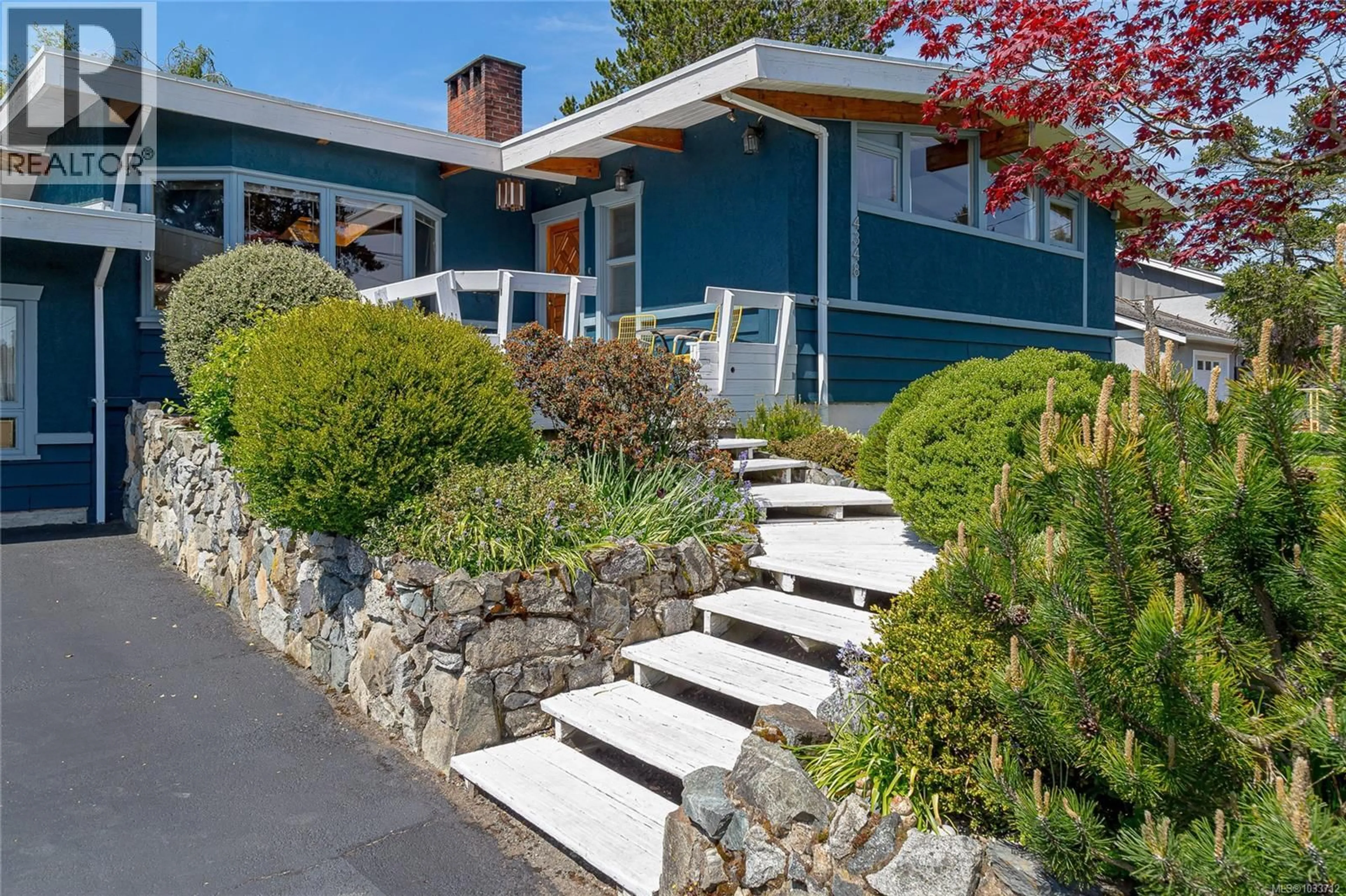 Home with vinyl exterior material, street for 4348 HARDER ROAD, Saanich British Columbia V8Z5L4