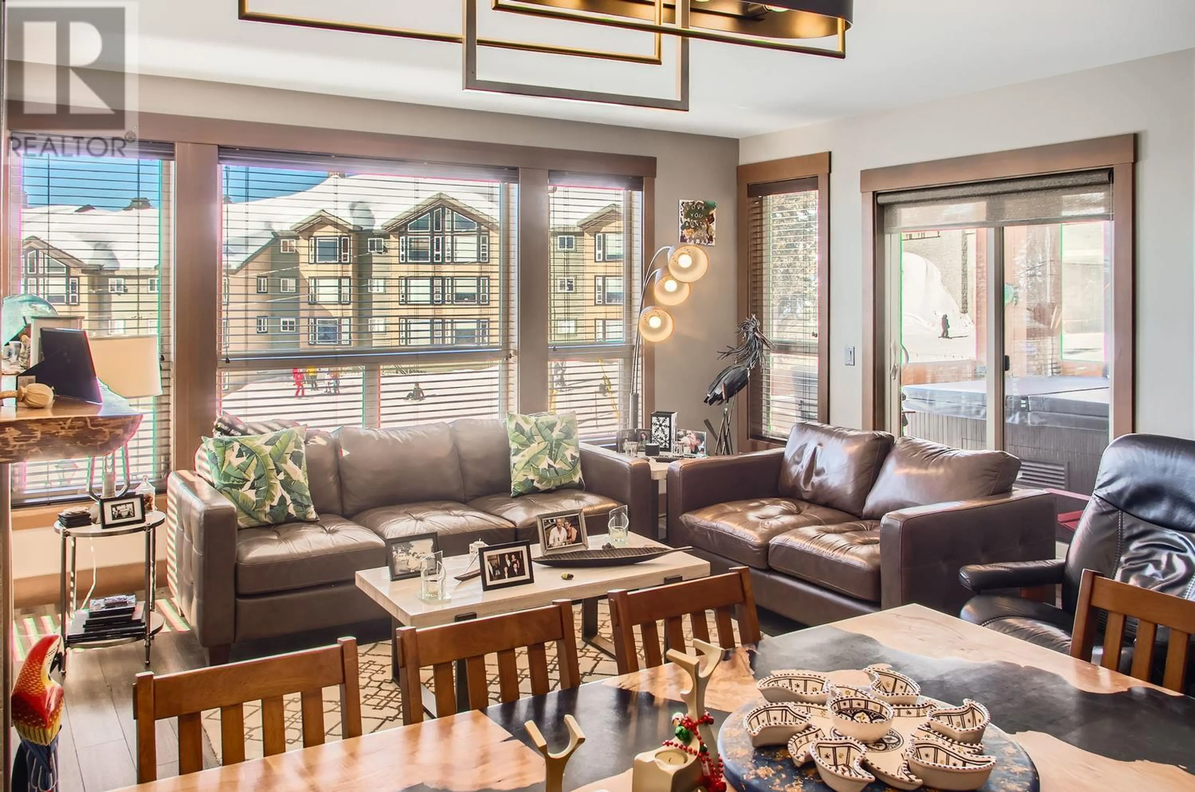 Living room with furniture, wood/laminate floor for 203B - 375 RAVEN RIDGE ROAD, Big White British Columbia V1P1T4