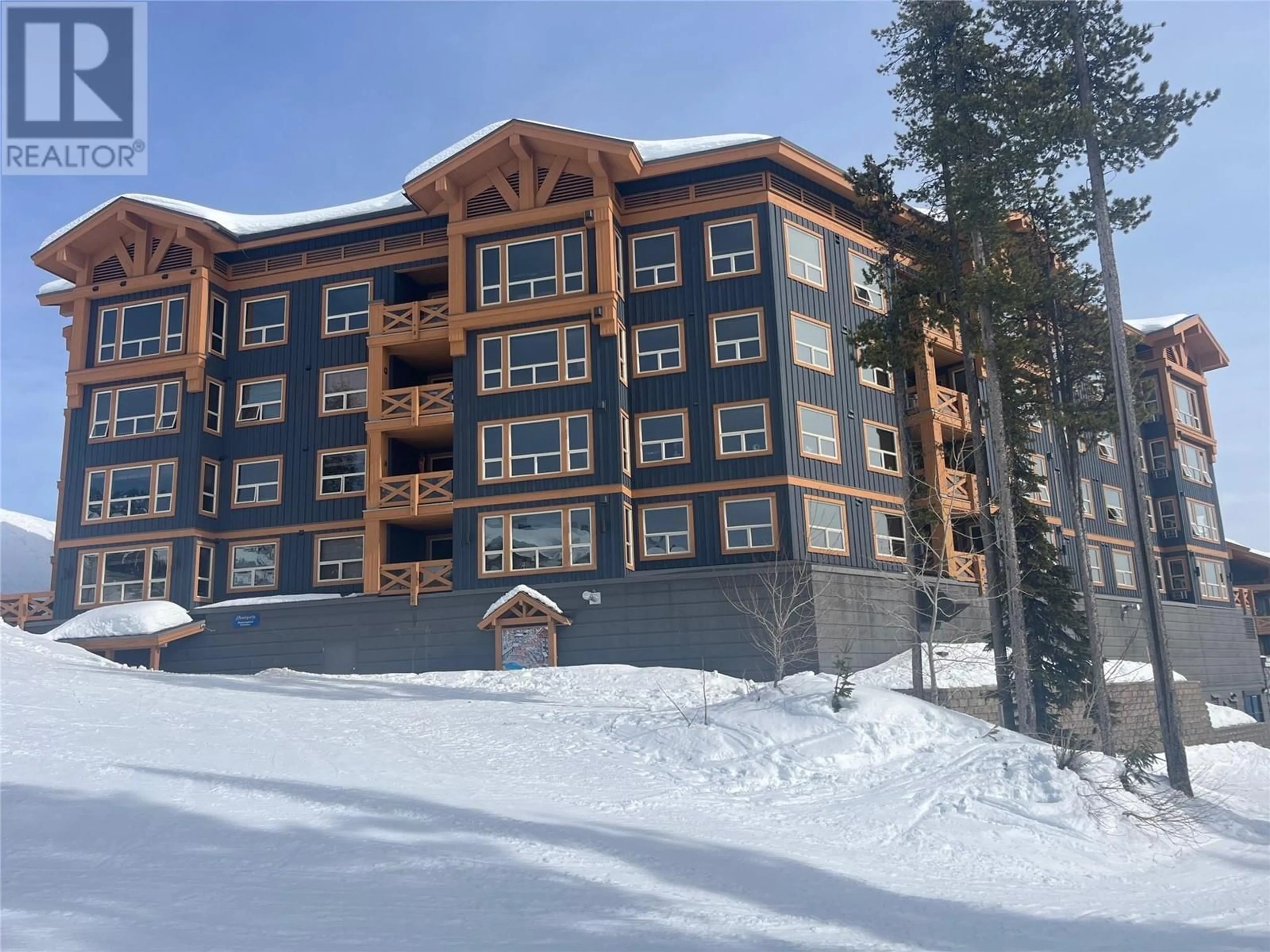A pic from outside/outdoor area/front of a property/back of a property/a pic from drone, mountain view for 203B - 375 RAVEN RIDGE ROAD, Big White British Columbia V1P1T4