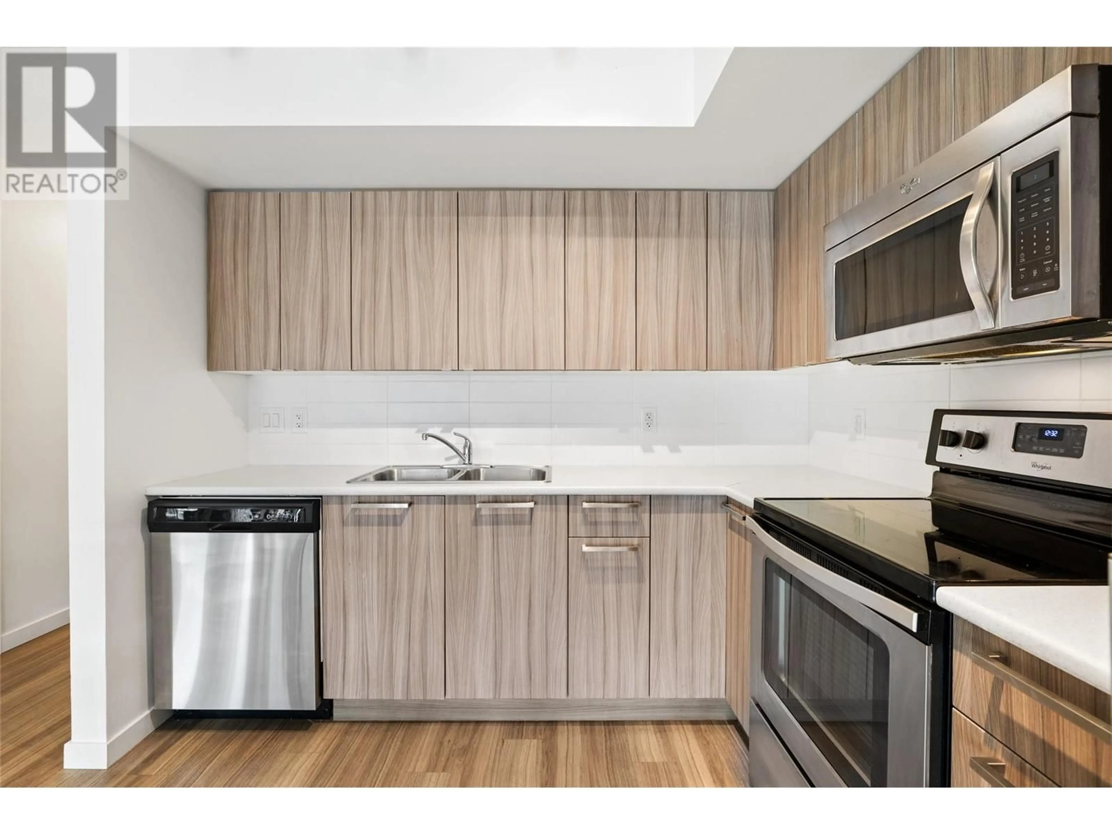 Standard kitchen, wood/laminate floor for 111 - 883 ACADEMY WAY, Kelowna British Columbia V1V0A3