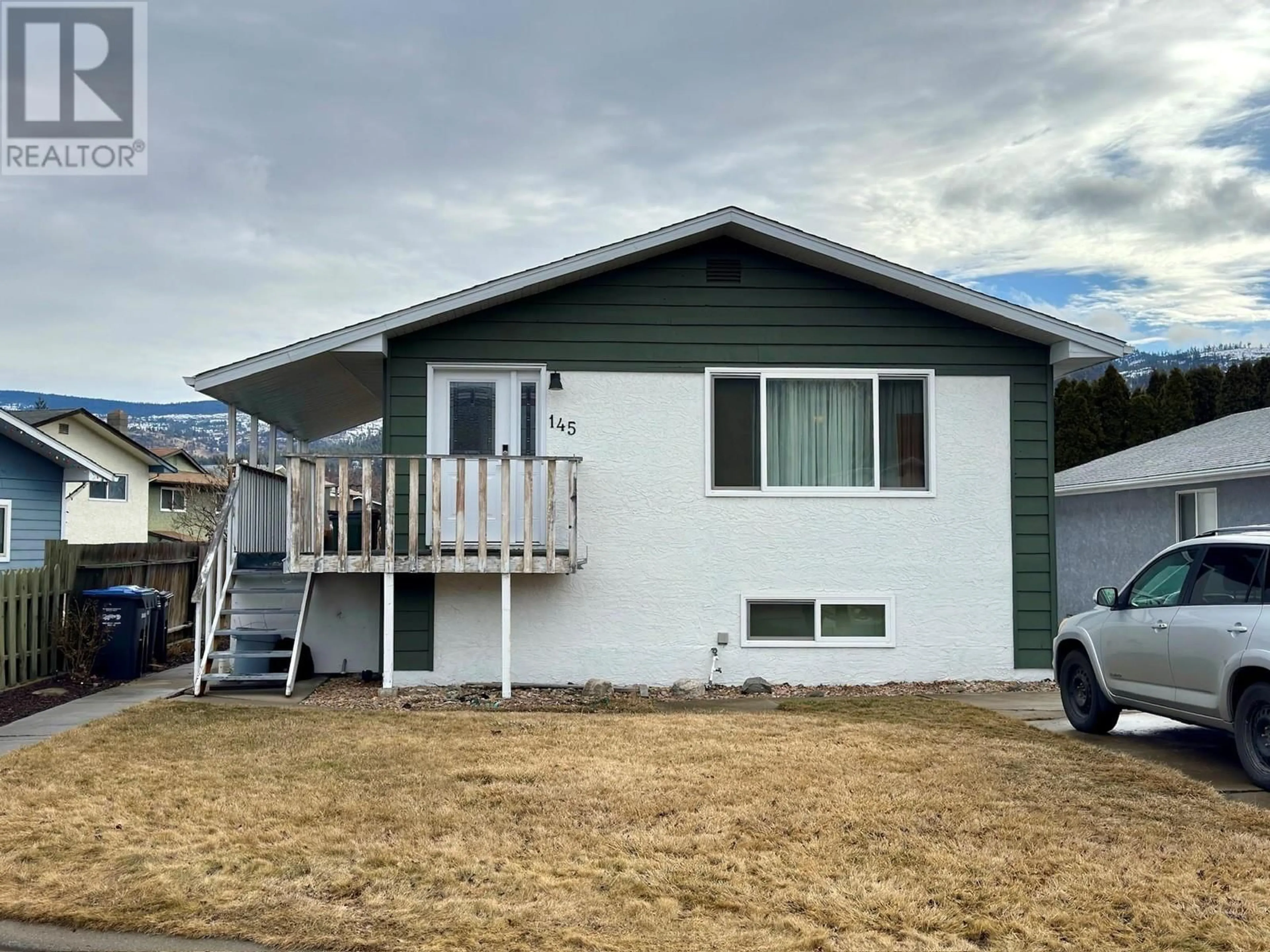 Home with vinyl exterior material, street for 145 BLAIRMORE CRESCENT, Penticton British Columbia V2A7E2