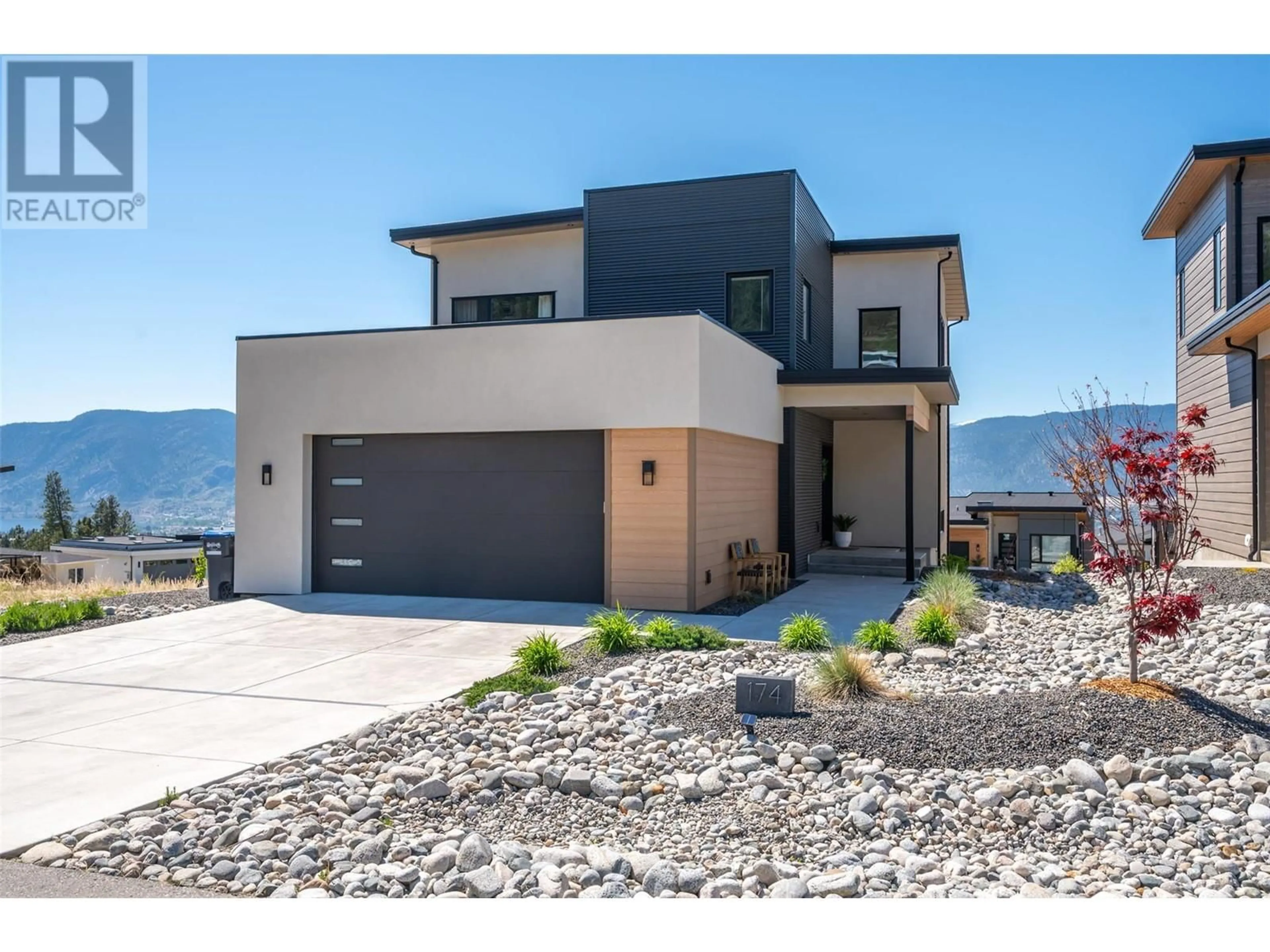 Home with brick exterior material, mountain view for 174 Fawn Court, Penticton British Columbia V2A0C8