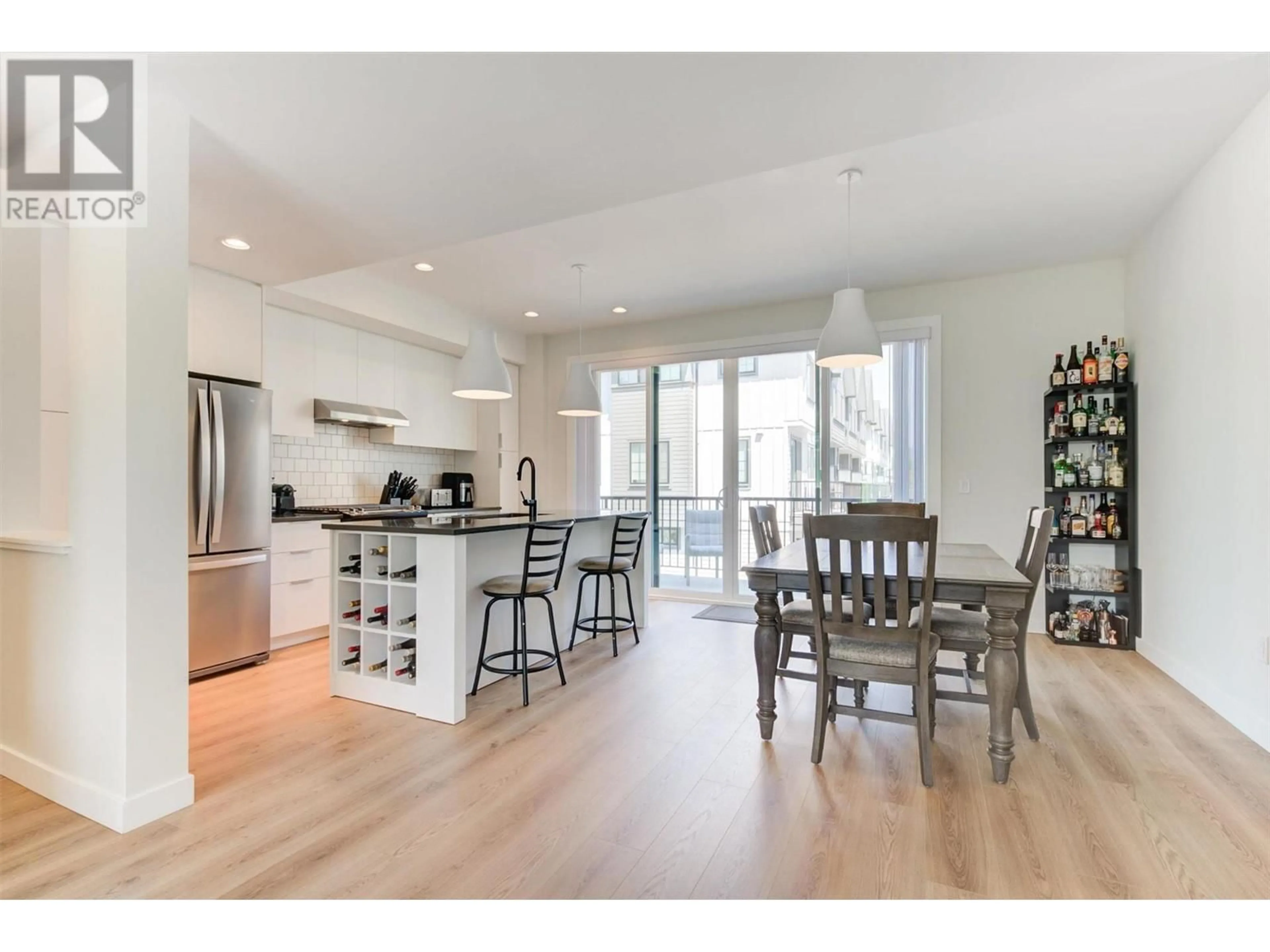 Open concept kitchen, wood/laminate floor for 29 - 307 GLEN PARK DRIVE, Kelowna British Columbia V1V0H1