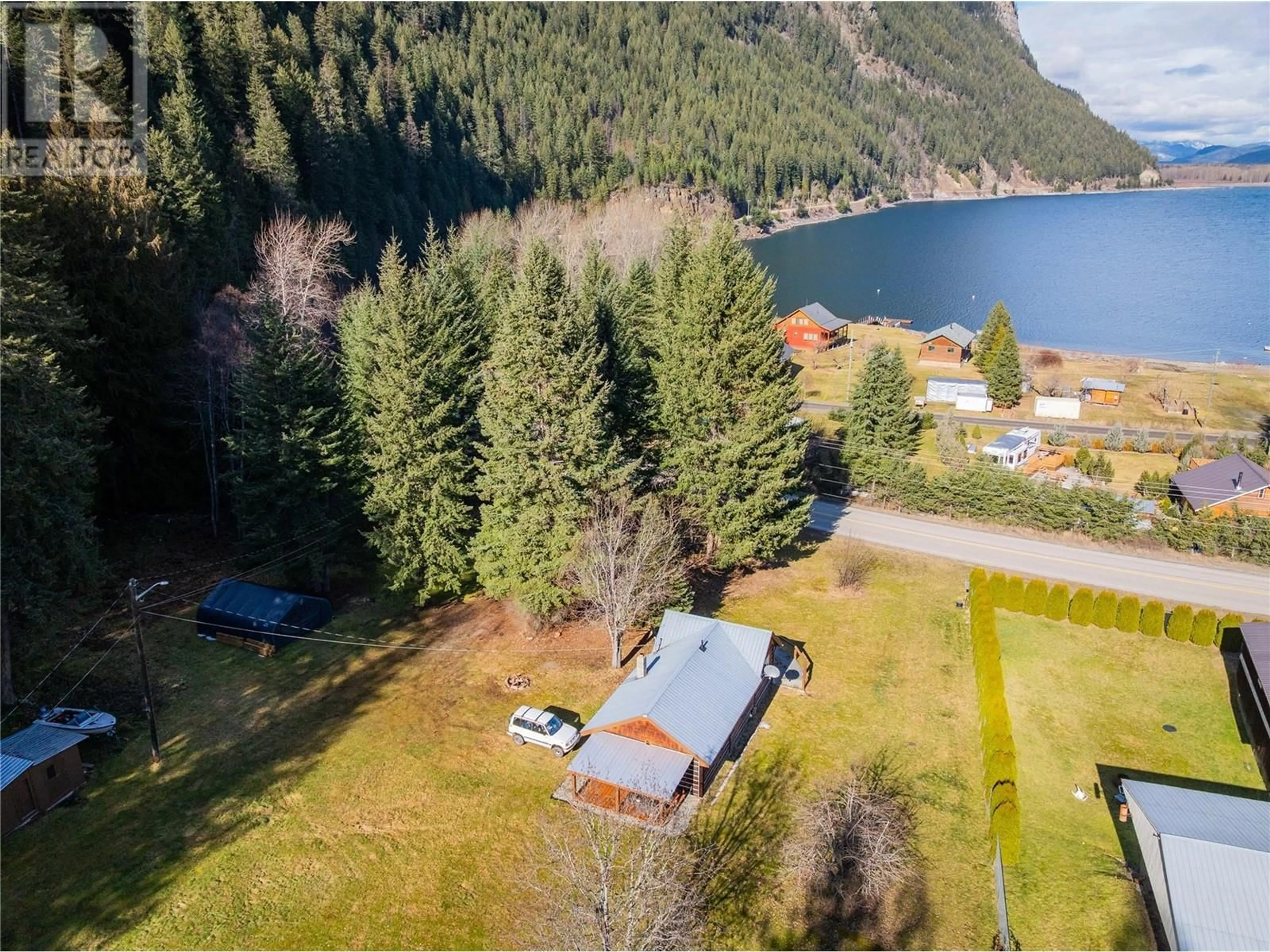 A pic from outside/outdoor area/front of a property/back of a property/a pic from drone, water/lake/river/ocean view for 11845 31 HIGHWAY, Kaslo British Columbia V0G1M0