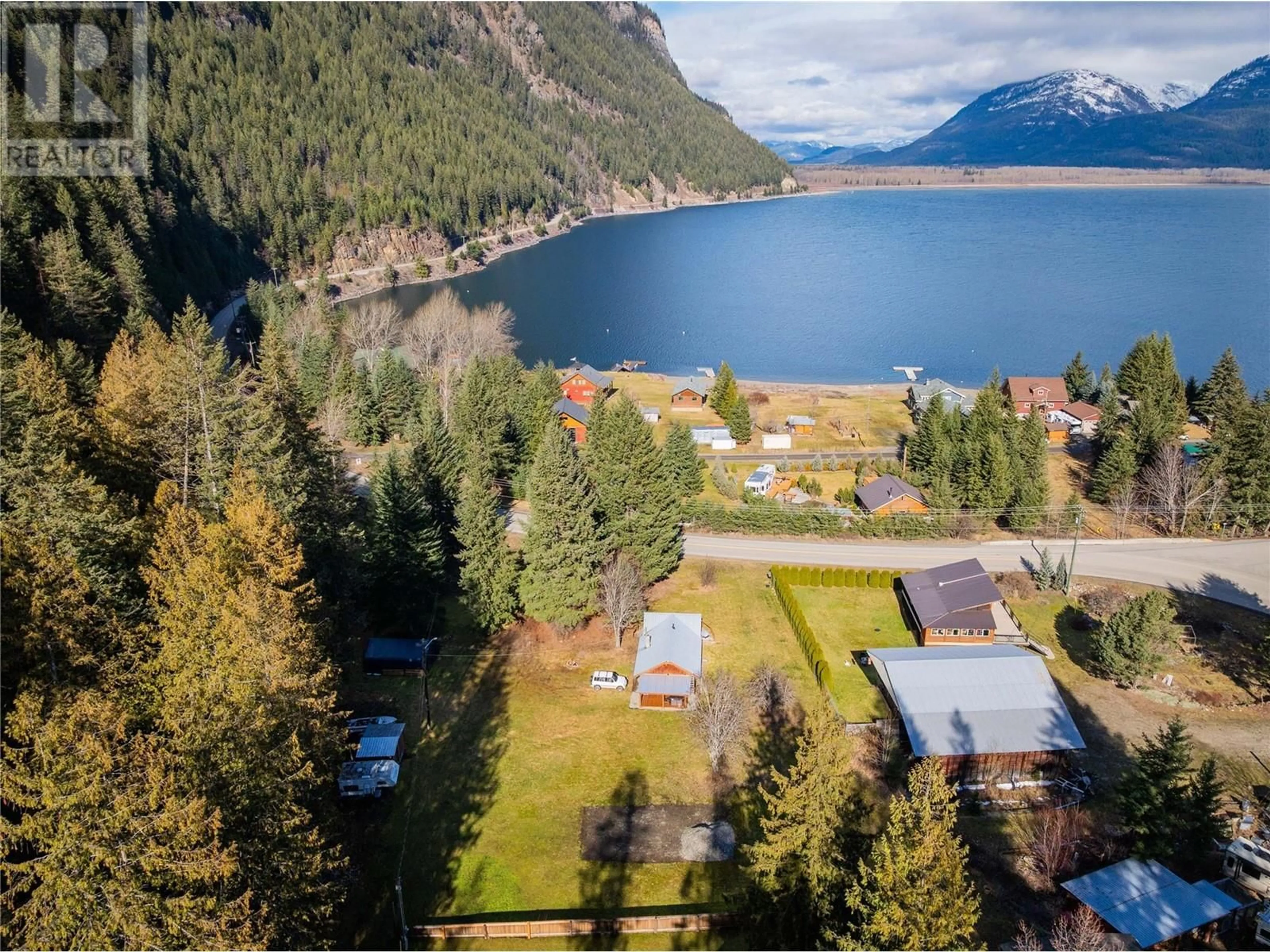 A pic from outside/outdoor area/front of a property/back of a property/a pic from drone, water/lake/river/ocean view for 11845 31 HIGHWAY, Kaslo British Columbia V0G1M0