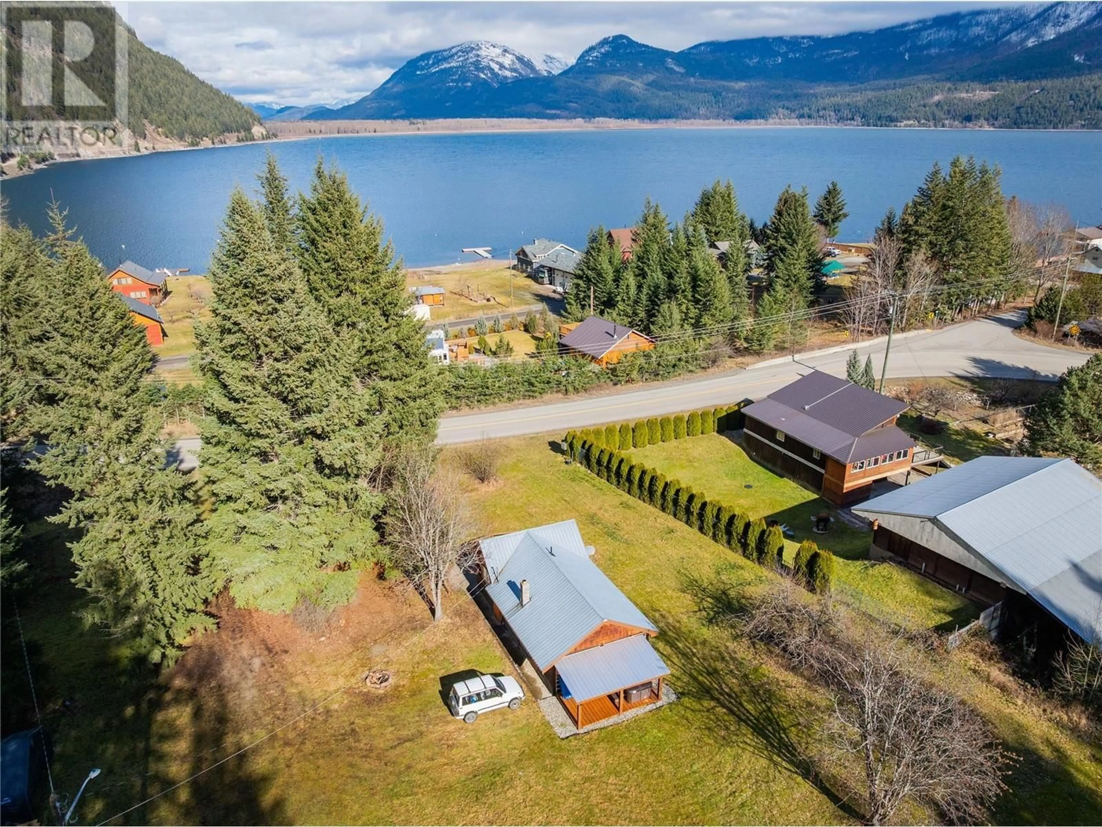 A pic from outside/outdoor area/front of a property/back of a property/a pic from drone, water/lake/river/ocean view for 11845 31 Highway, Kaslo British Columbia V0G1M0