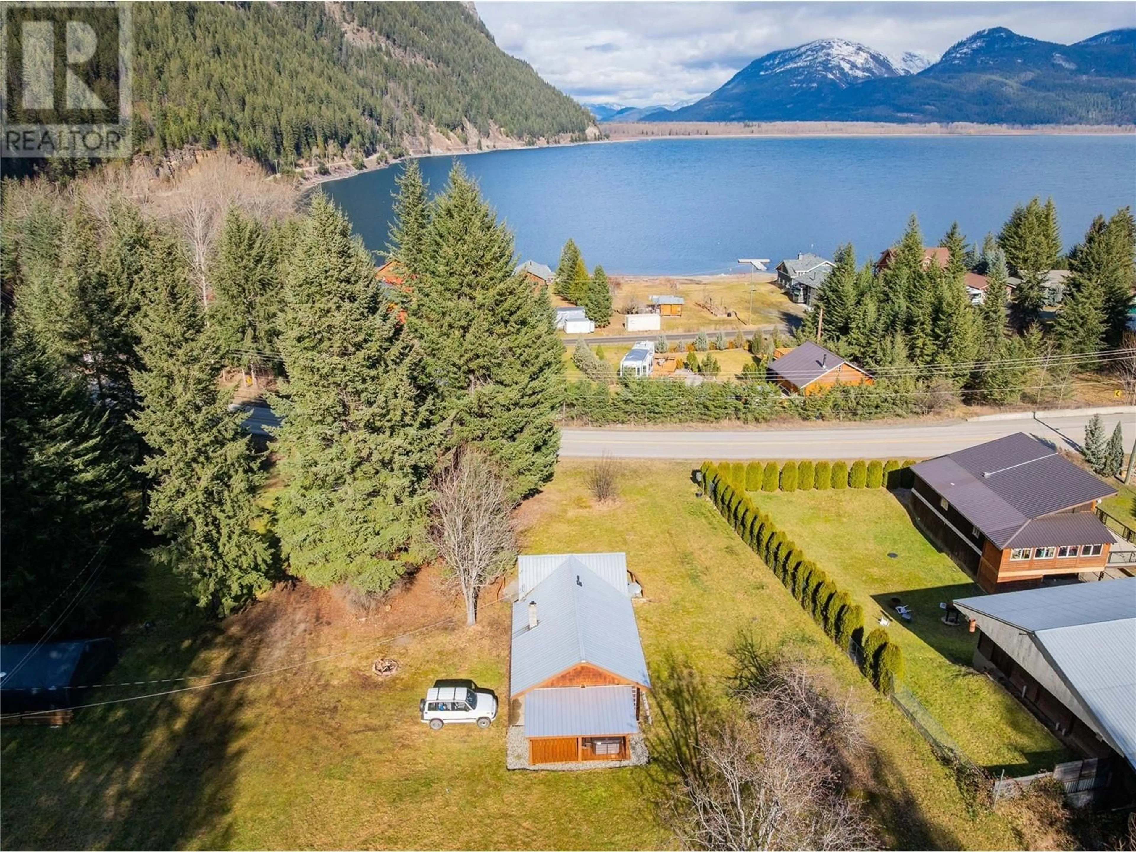 A pic from outside/outdoor area/front of a property/back of a property/a pic from drone, water/lake/river/ocean view for 11845 31 Highway, Kaslo British Columbia V0G1M0