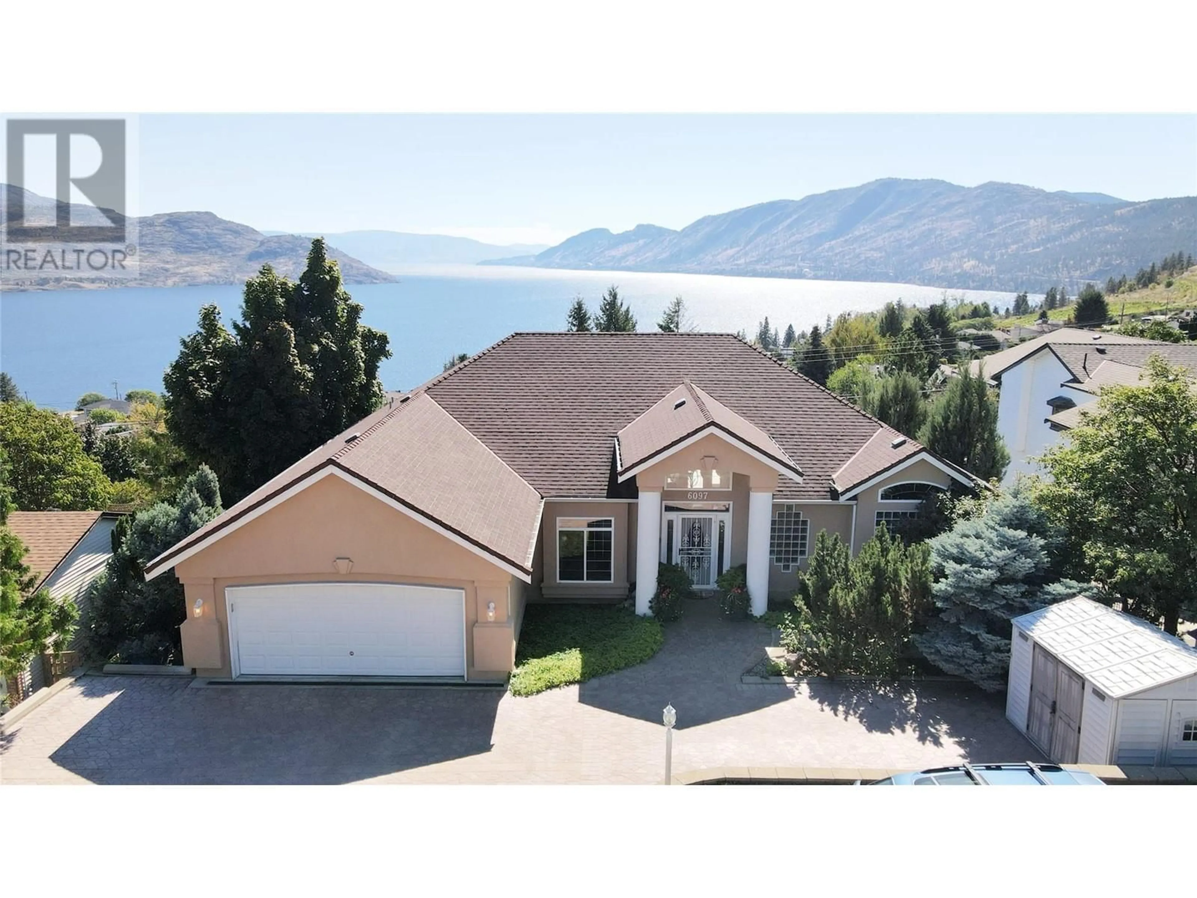 A pic from outside/outdoor area/front of a property/back of a property/a pic from drone, mountain view for 6097 BEATRICE ROAD, Peachland British Columbia V0H1X4
