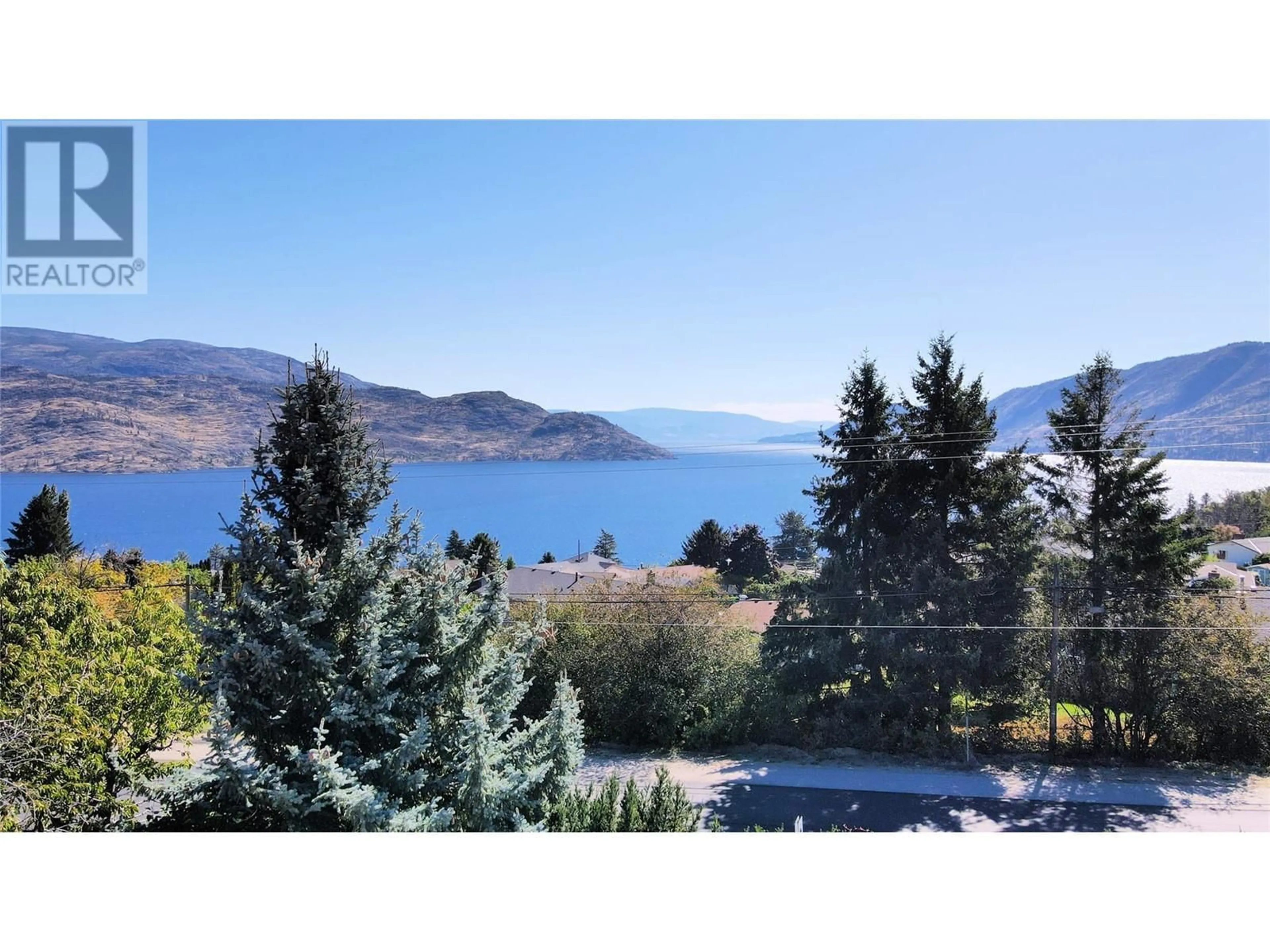 A pic from outside/outdoor area/front of a property/back of a property/a pic from drone, water/lake/river/ocean view for 6097 BEATRICE ROAD, Peachland British Columbia V0H1X4
